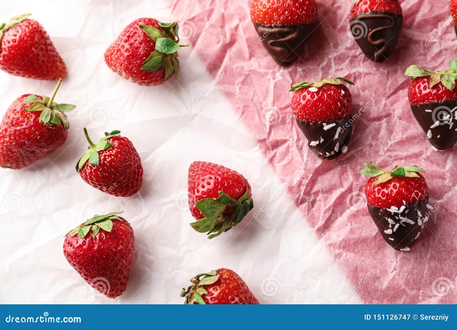 Delicious Strawberries Covered with Chocolate on Parchment Stock Image