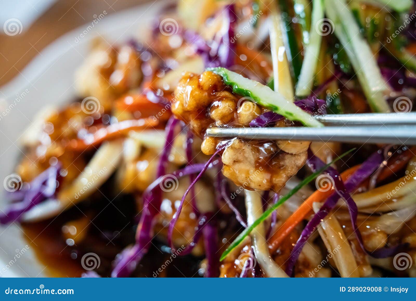delicious sweet and sour sauced deep fried pork, tangsuyuk, with vegetables