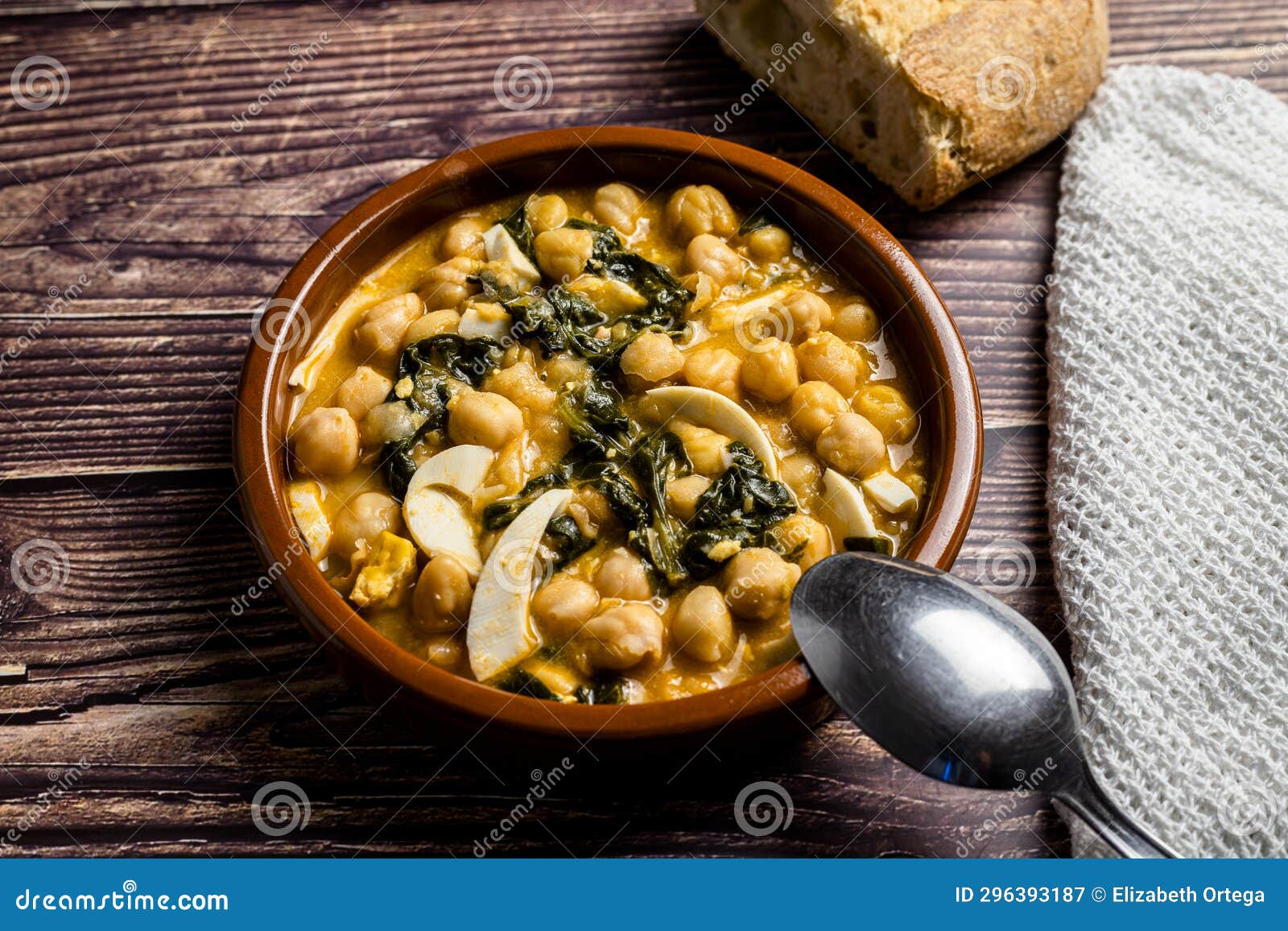 Delicious and Traditional Dish of Chickpea Stew with Spinach and Egg