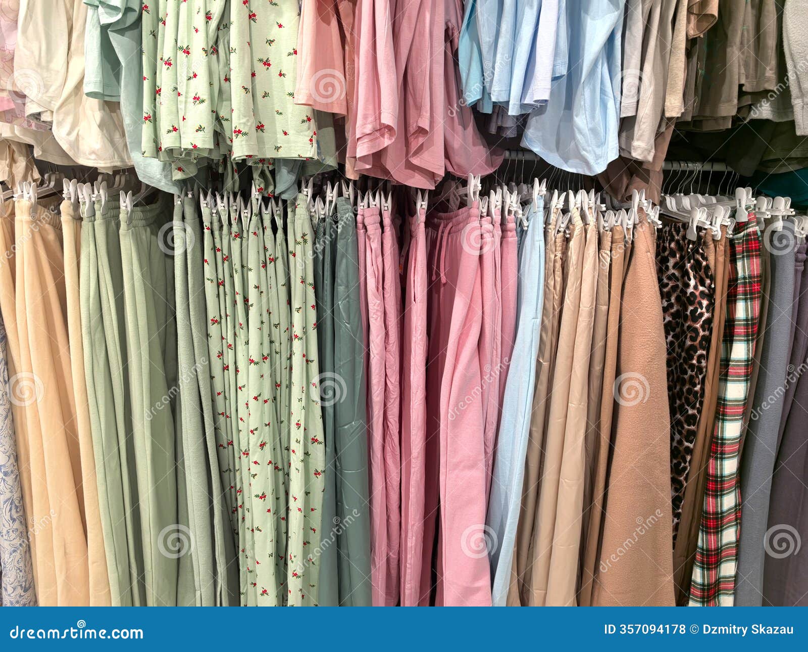 vibrant display of colorful clothing arranged neatly in a boutique setting