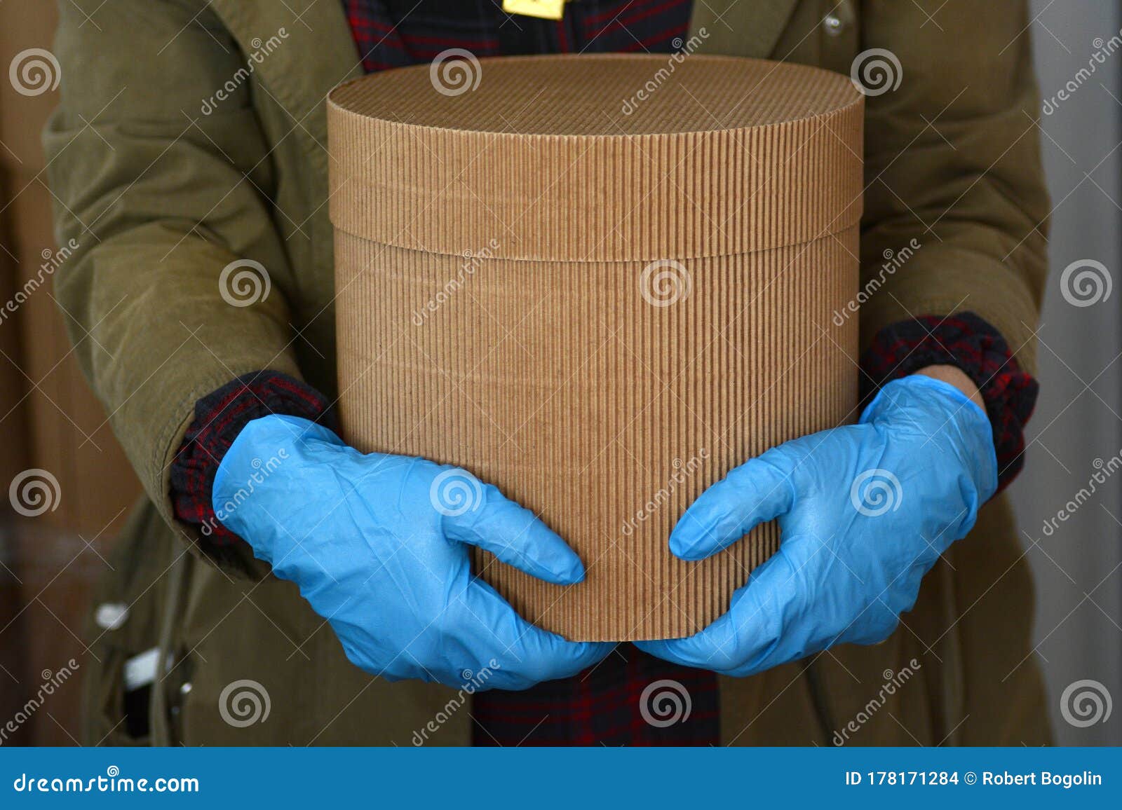 Delivery box with gloves. stock photo. Image of decorations 178171284