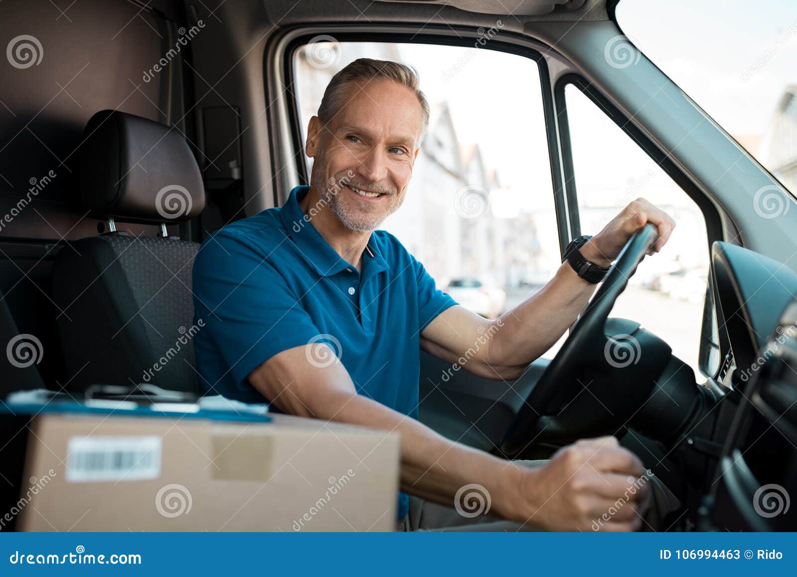 delivery man driving van