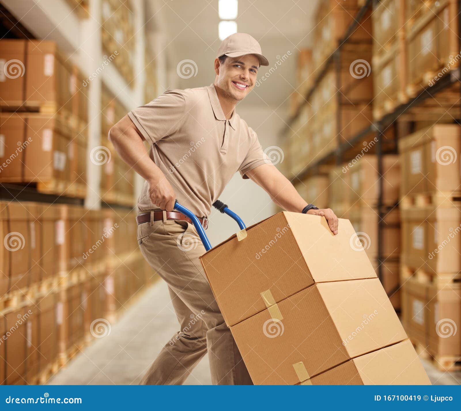 Delivery Man With A Hand Truck Loaded Boxes Stock Image Of.