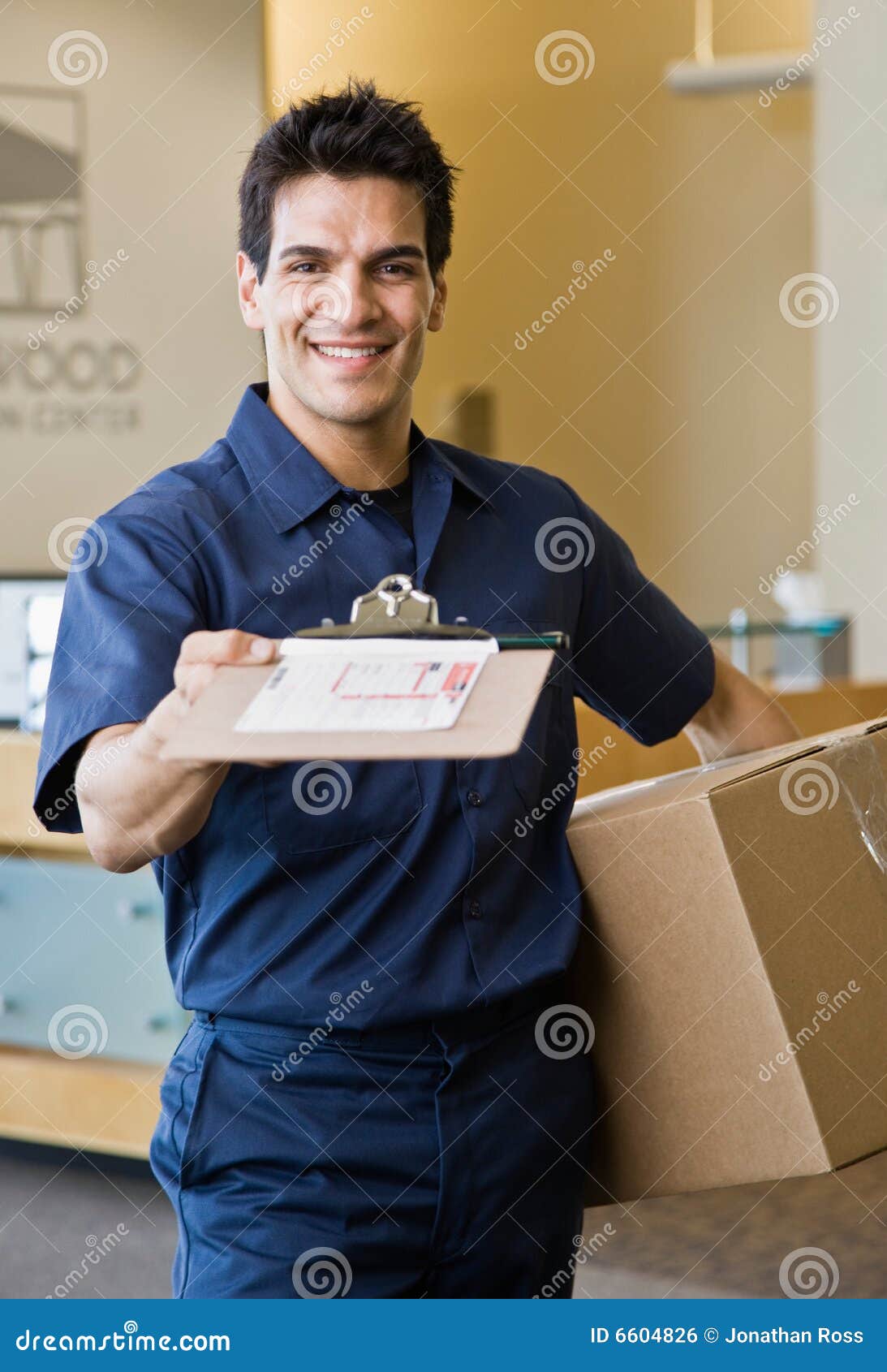 Delivery Man Presenting Shipping Receipt Stock Photo Image of