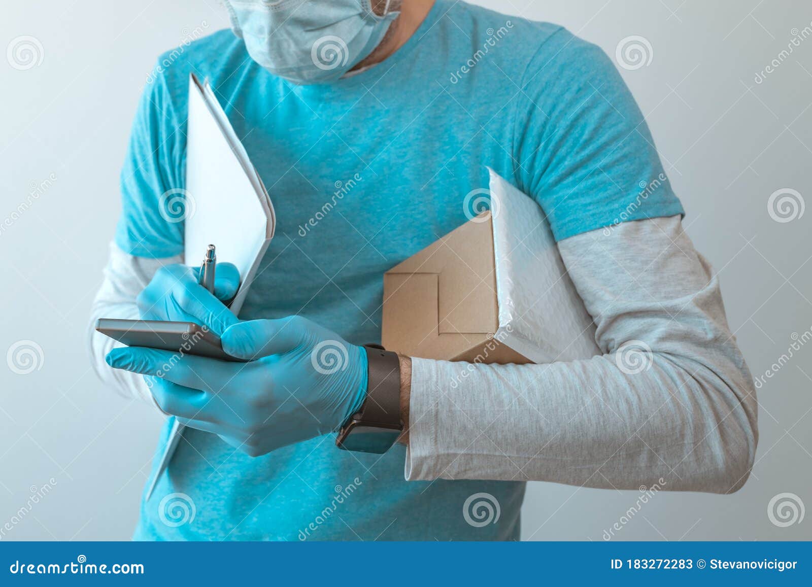 Delivery Man with Protective Clothing Using Smartphone Stock Image Image of adult, male 183272283