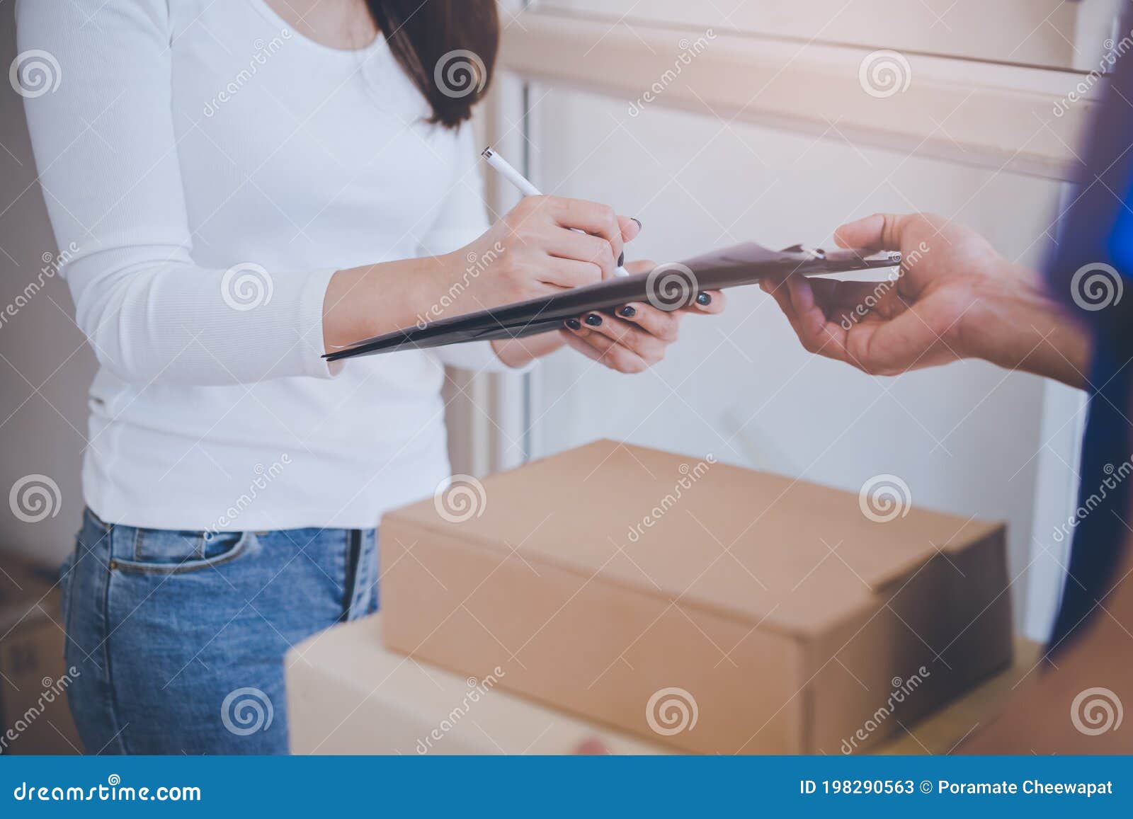 Delivery Man Sending Package To Receiver on Doorway Stock Image Image