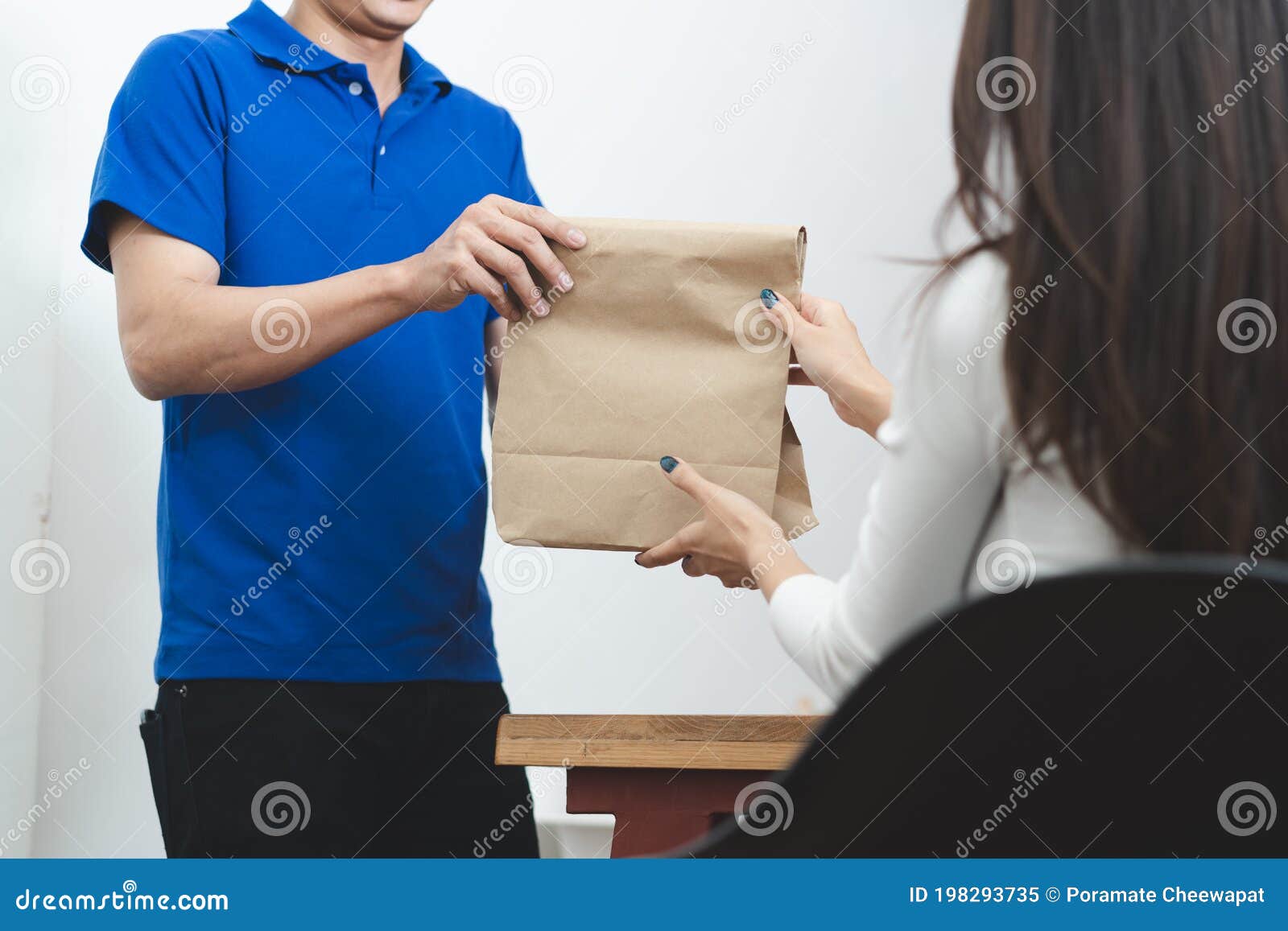 Delivery Man Sending Package To Receiver on Doorway Stock Image Image