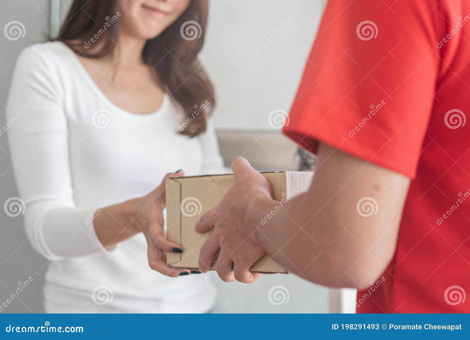 Delivery Man Sending Package To Receiver on Doorway Stock Image Image