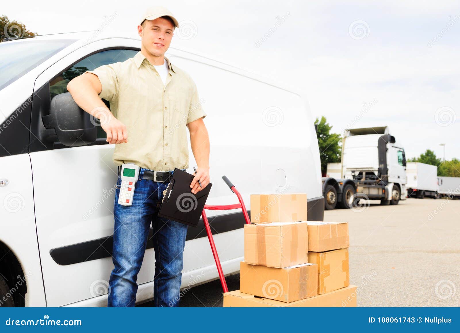 Delivery Boy Standing Next To His Van 