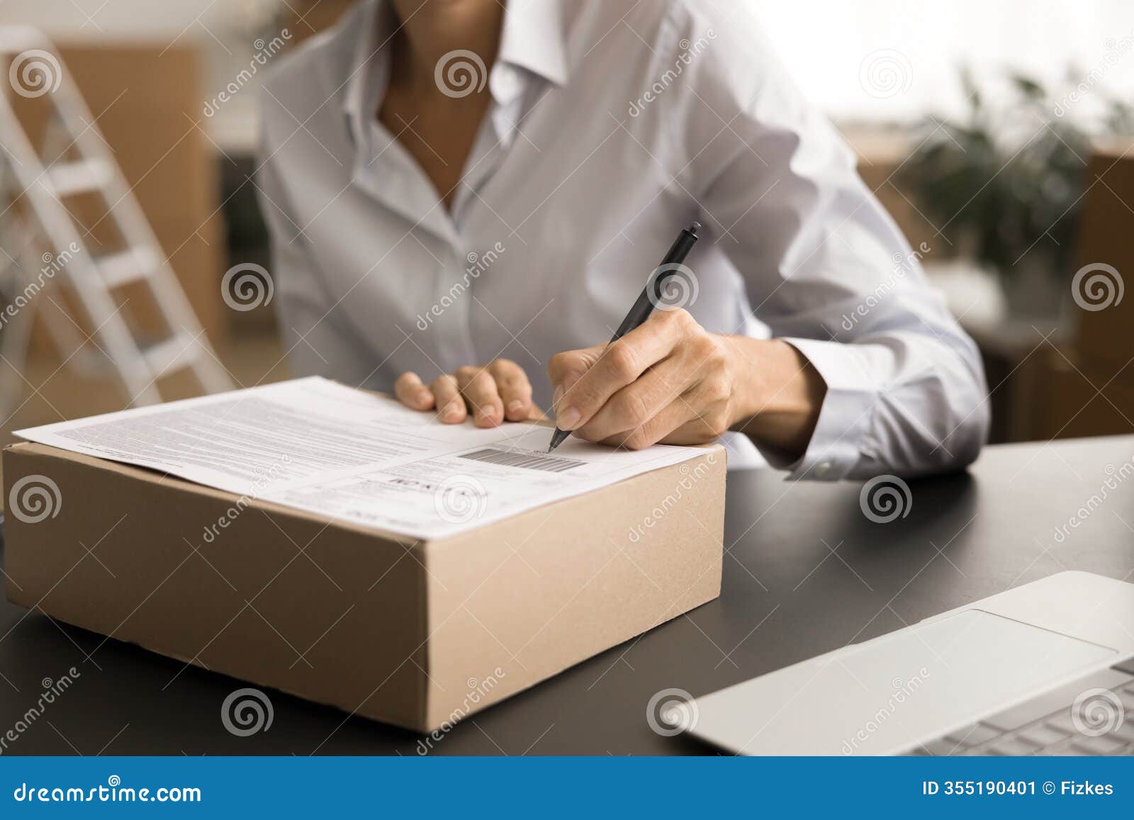 delivery service employee sending package with purchase