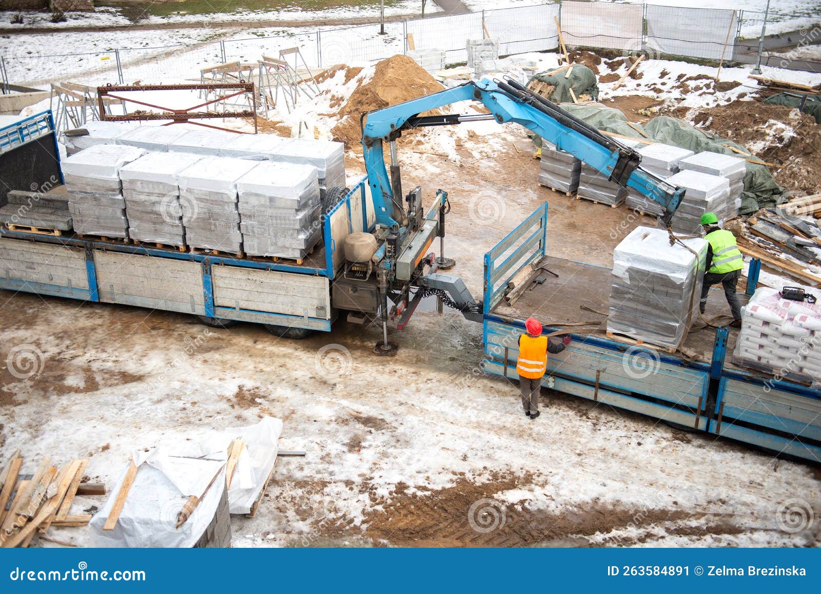 Delivery and Unloading from Truck of Aerated Concrete Blocks Building