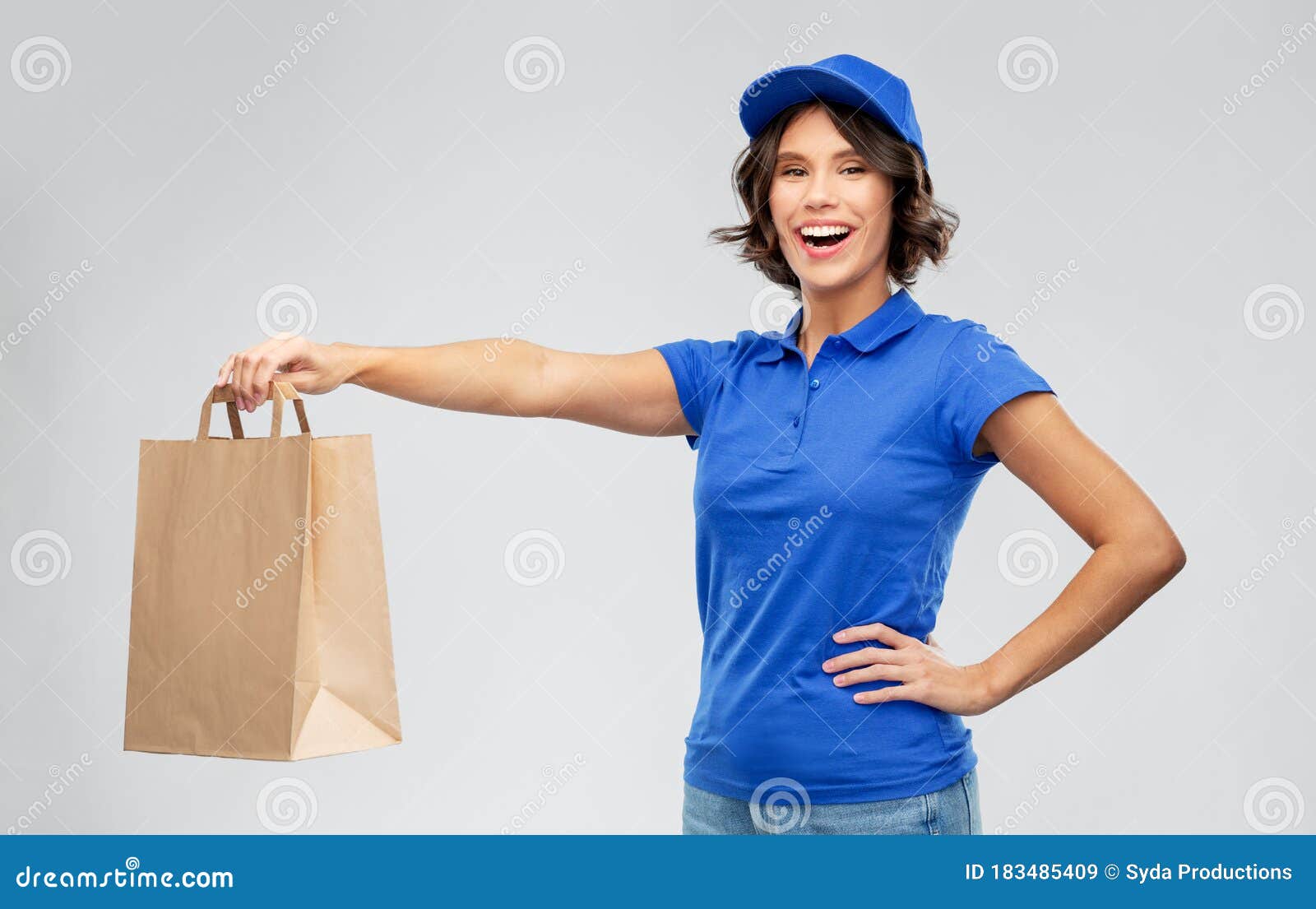 delivery woman with takeaway food in paper bag