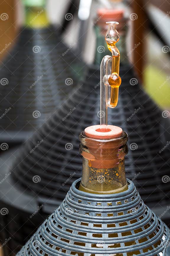 Demijohn with Glass Fermentation Lock. Stock Image Image of closeup