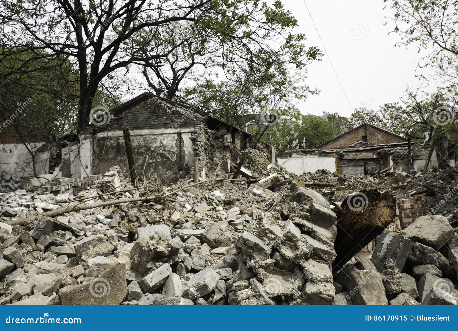 Old Demolished House And Construction Of New High Rise Residential
