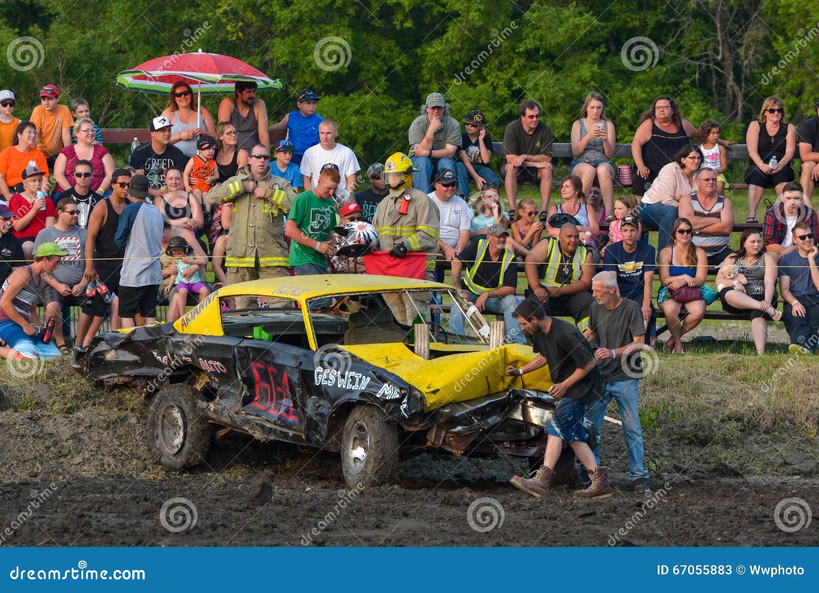 Demolition derby cars entertain the crowd at Triple S Fair &amp; Rodeo. Selkirk Town, MB, Canada