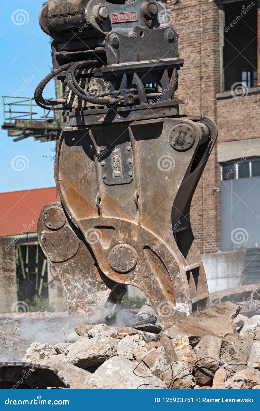Demolition Grapple of an Excavator on a Construction Site during
