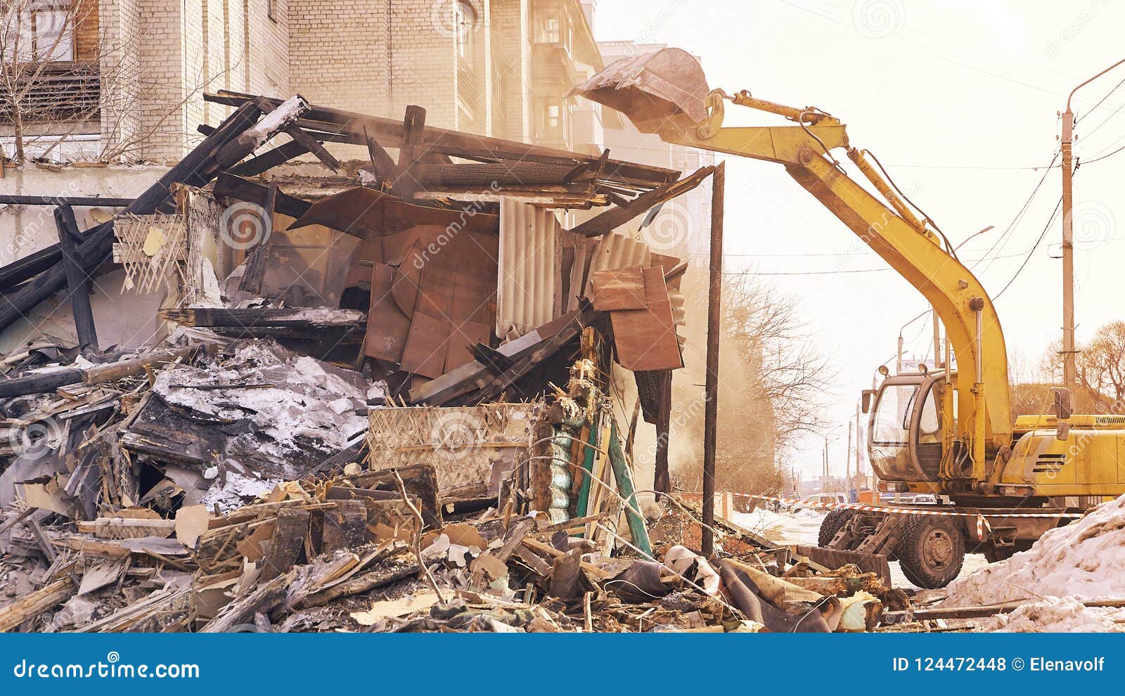 Demolition House Using Excavator in City. Rebuilding Process Stock
