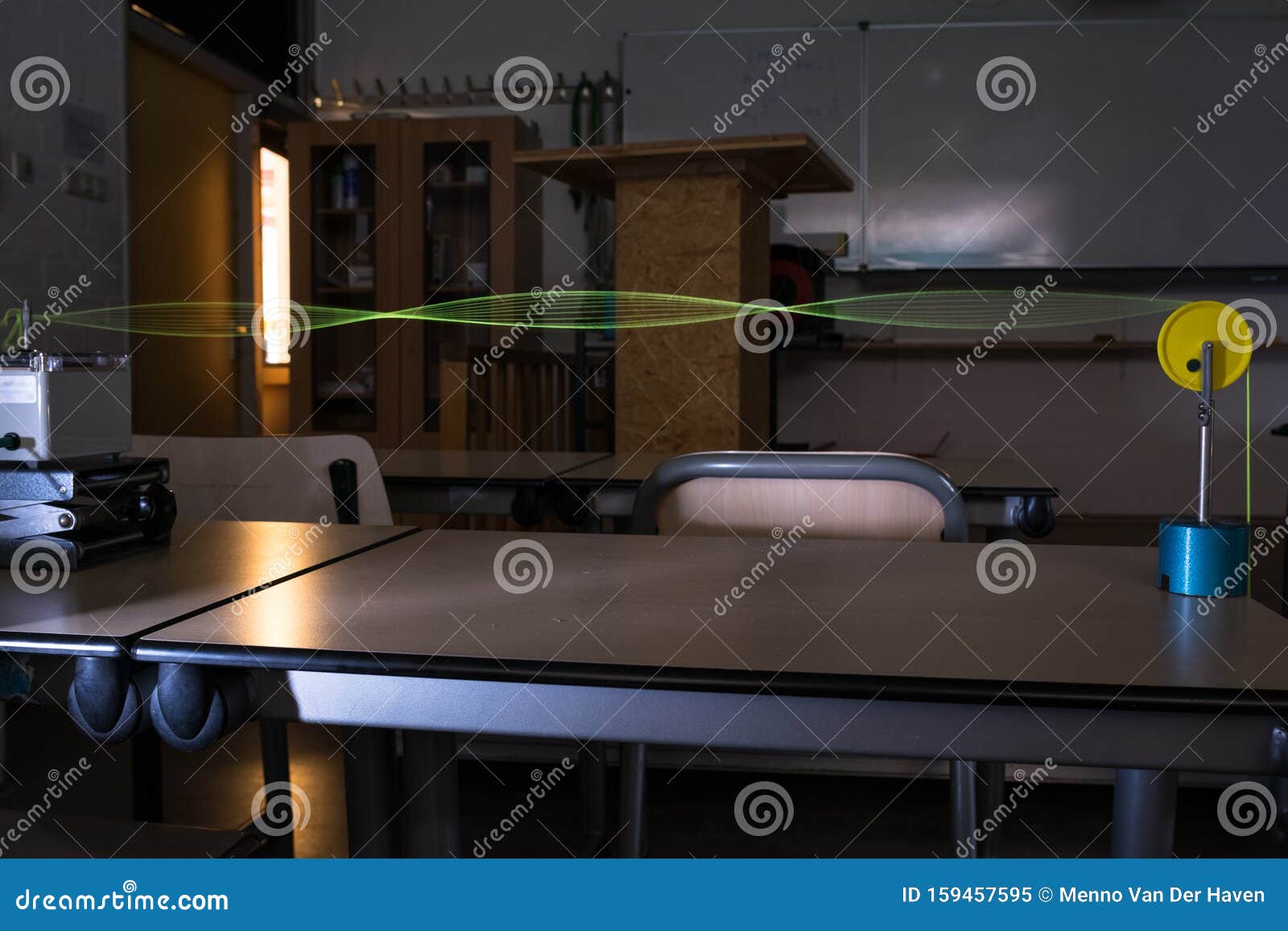 Demonstration of Standing Waves on a String, Illuminated by Stroboscope