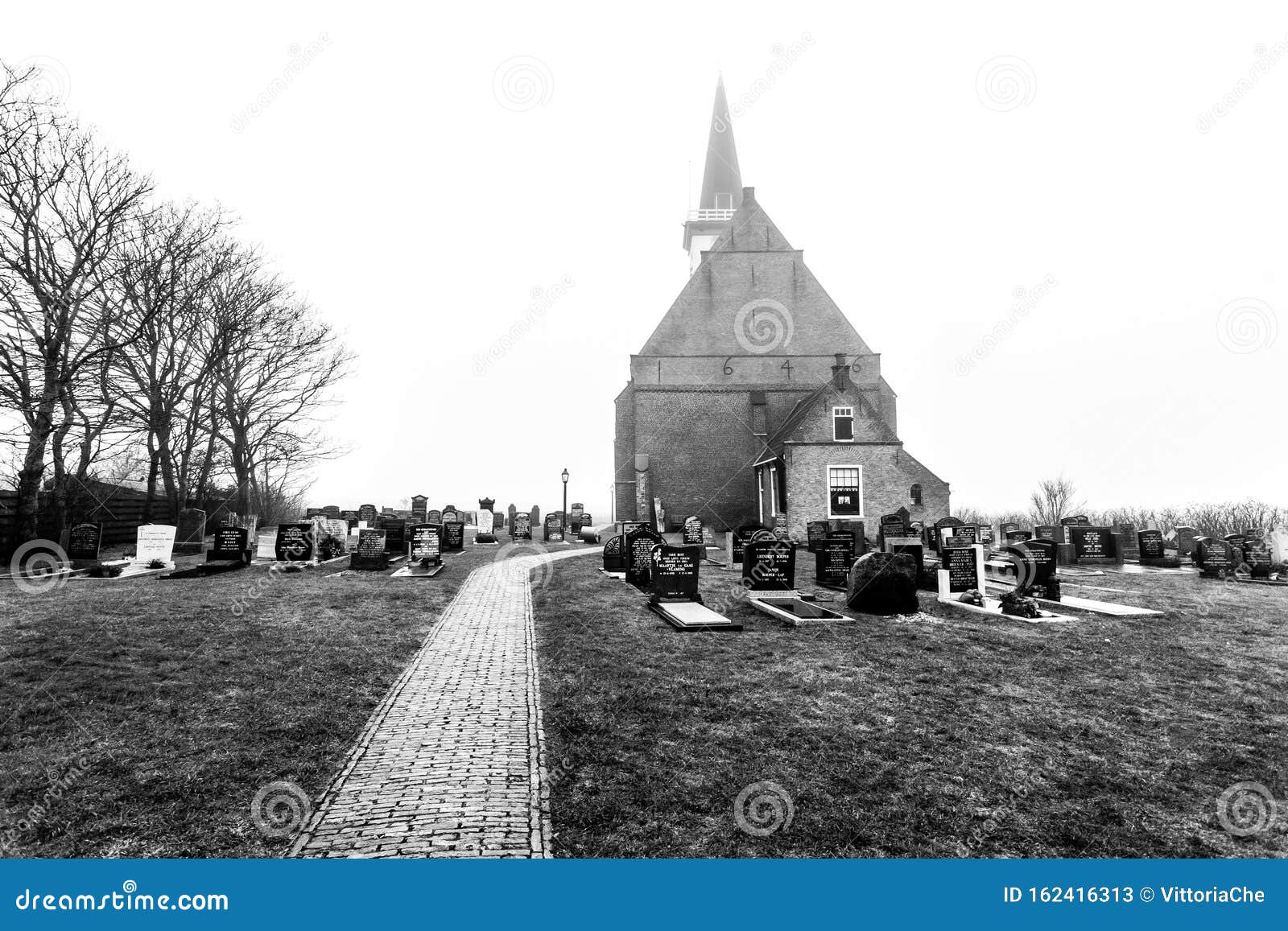 Kerk Den Hoorn Texel Den Hoorn, the Netherlands - February 25, 2010: Autumn Foggy Morning