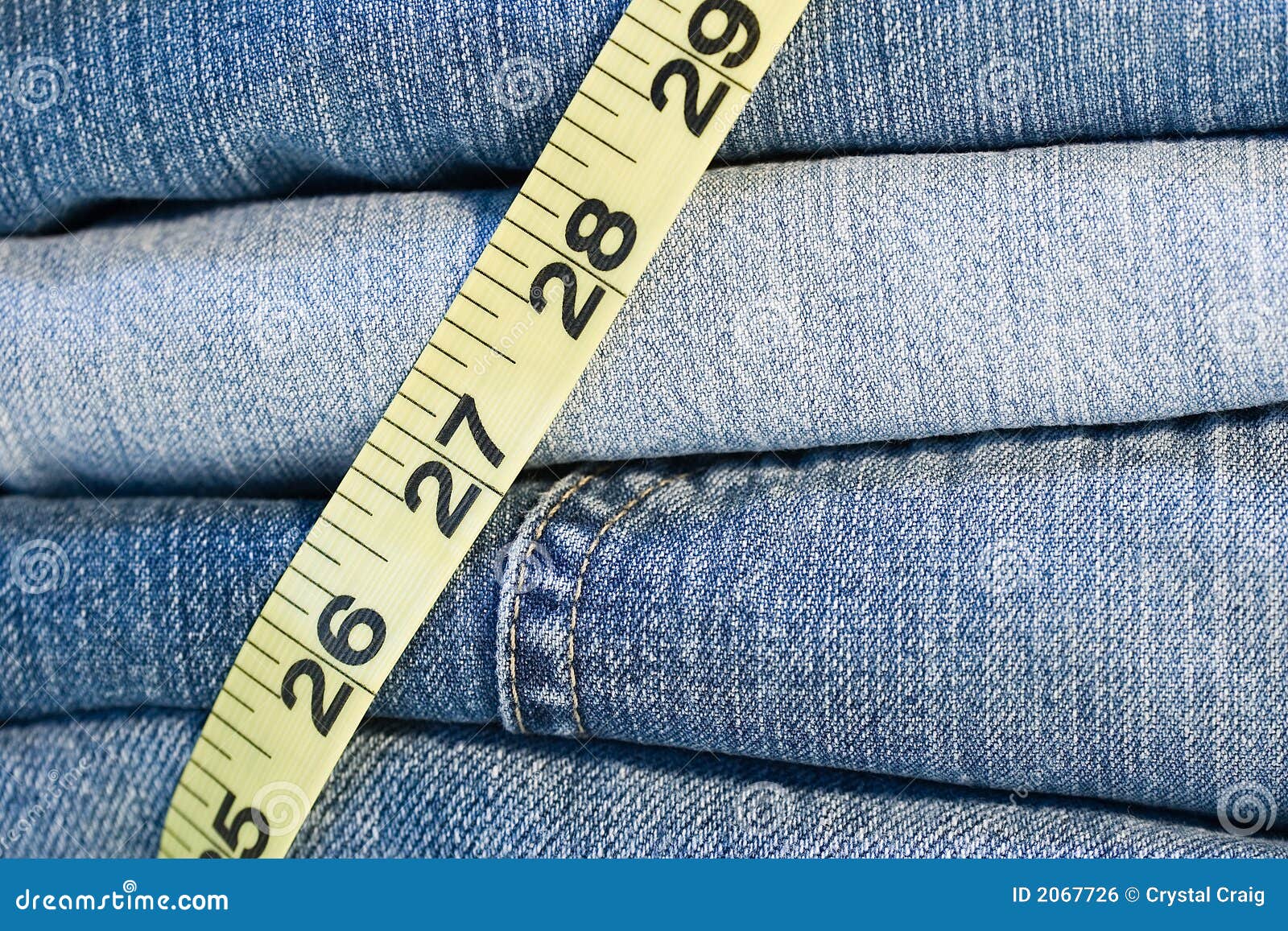 Denim Jeans measuring tape stock photo. Image of size 2067726