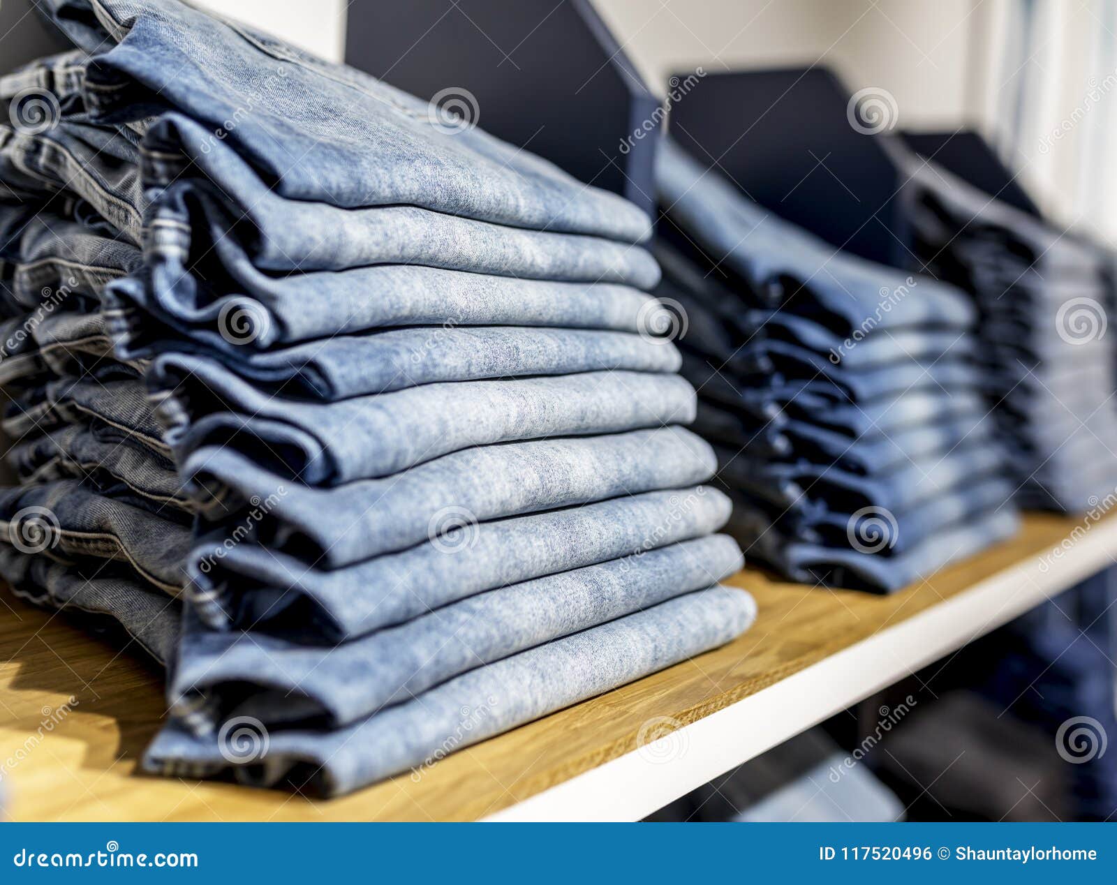 Denim Jeans or Pants on a Shelf in a Boutique Clothing and Apparel ...