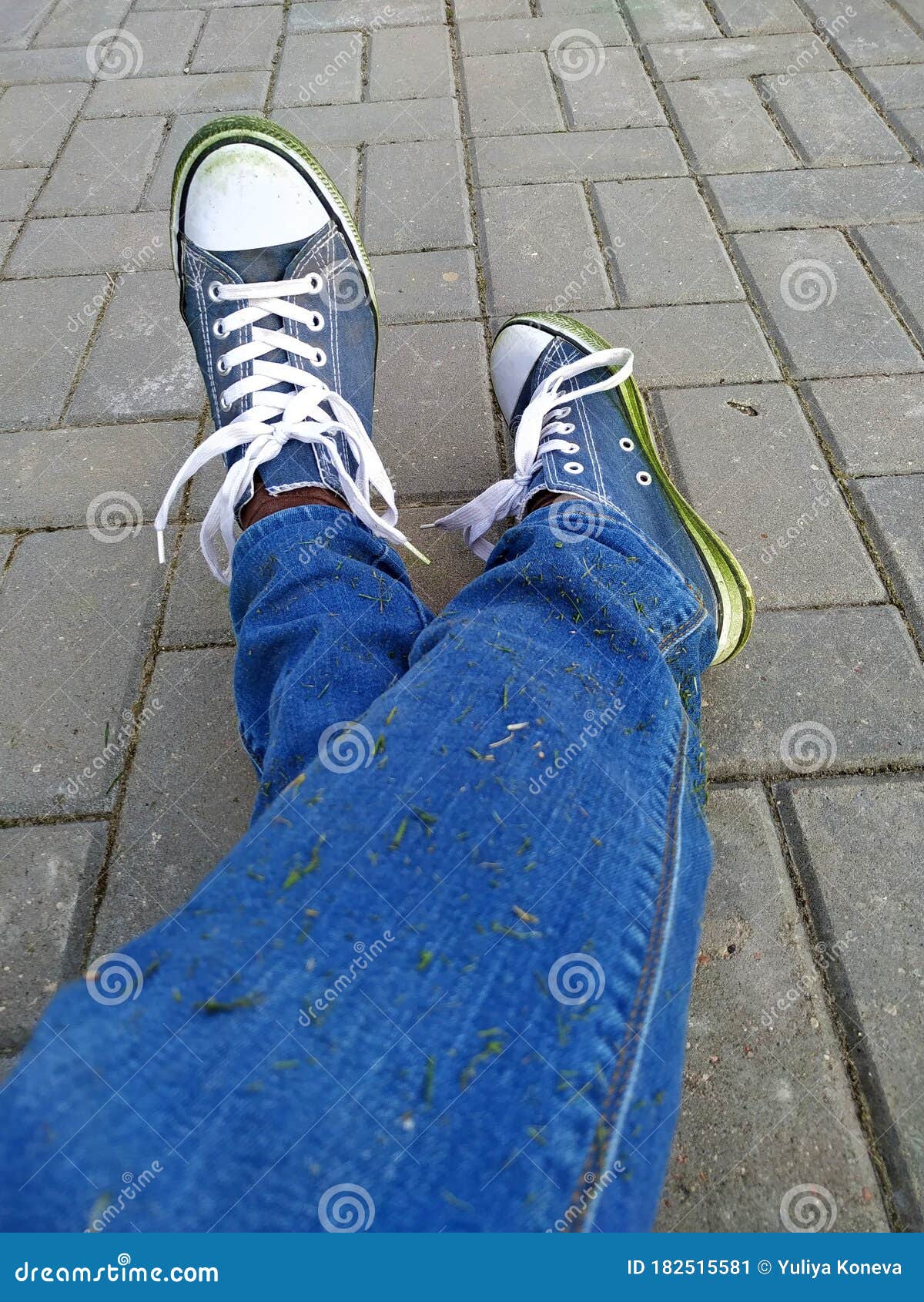 Denim Sneakers Stained with Green Grass from a Long Walk Stock Image ...