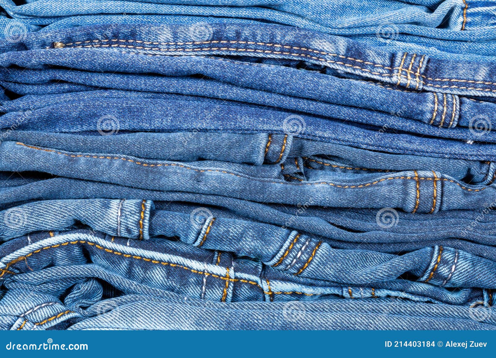 Denim Trousers Folded in a Pile on a Store Window Stock Photo - Image ...