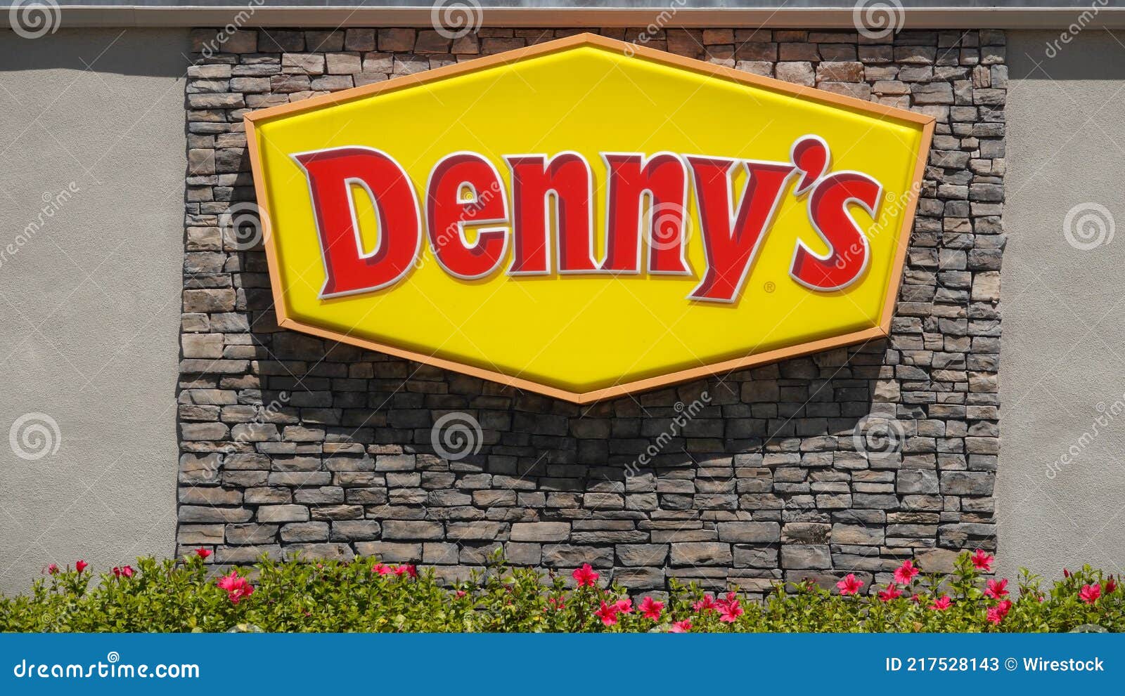 Denny s logo on wall editorial stock photo. Image of stone - 217528143