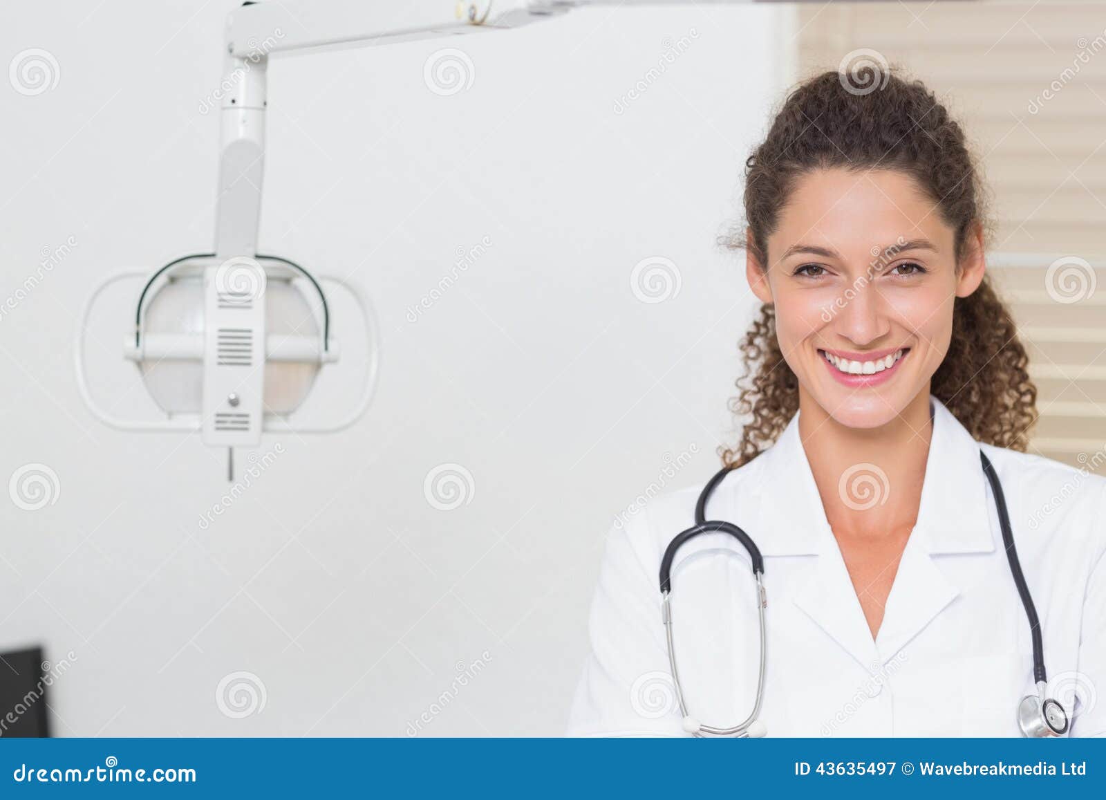 Dental Assistant Smiling at Camera beside Light Stock Image Image of