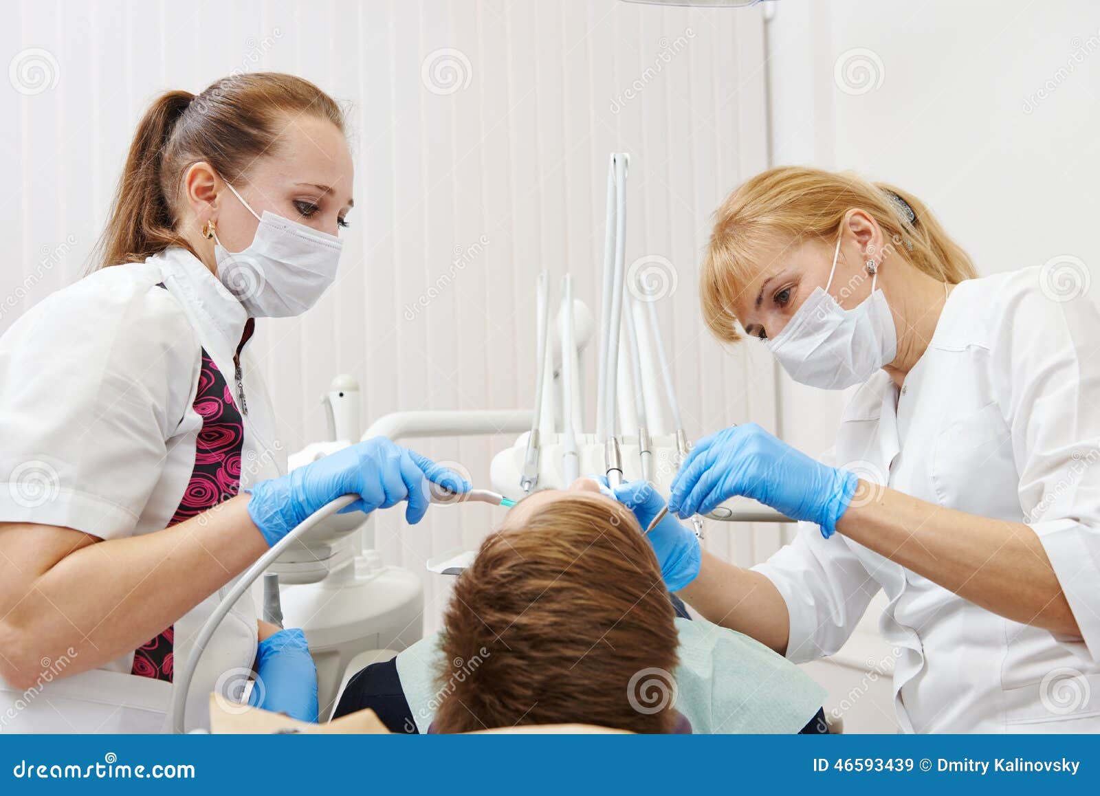 dental-care-clinic-dentist-orthodontist-female-doctor-making-to-patient-working-place-46593439.jpg