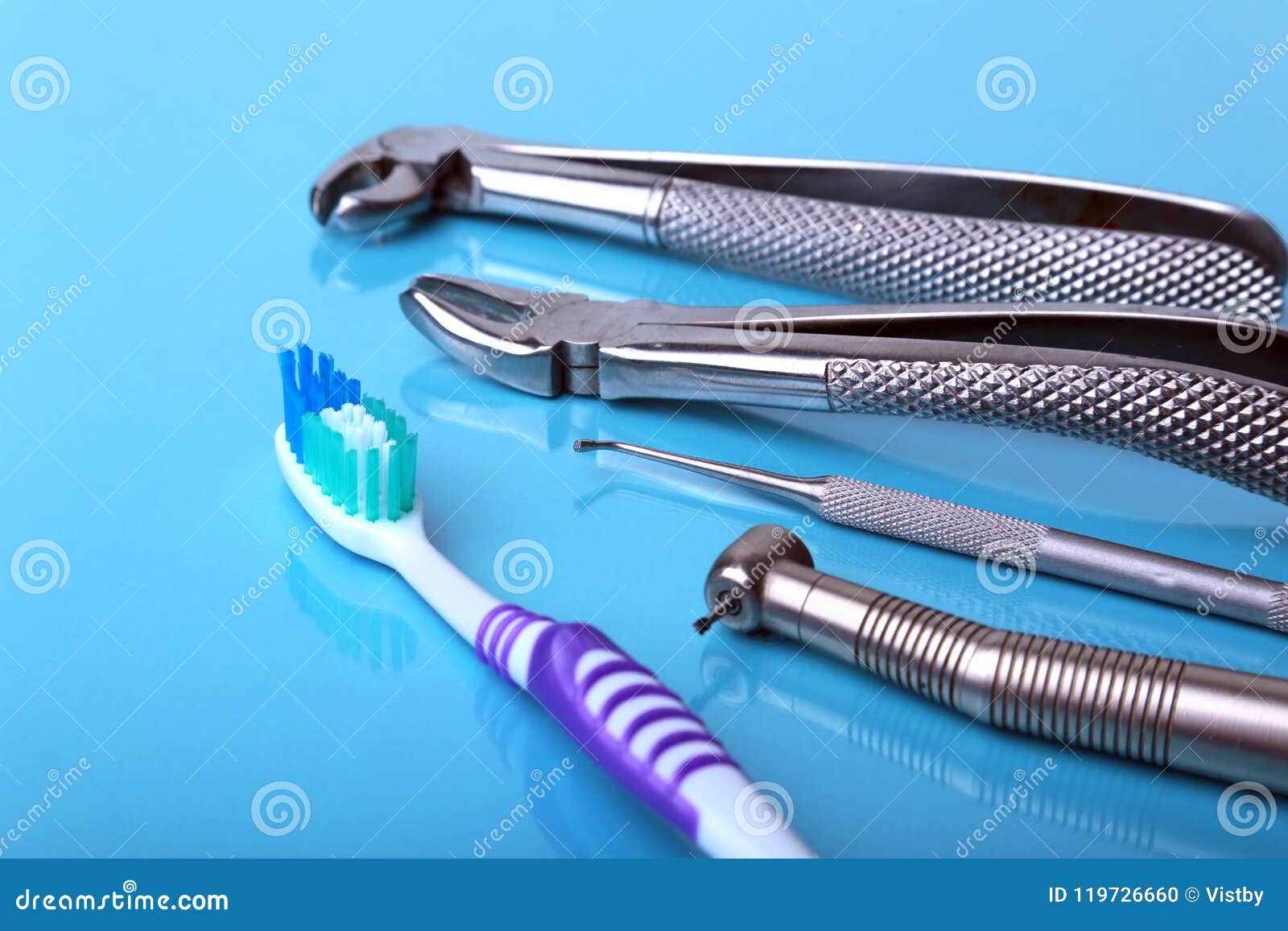 Dental Care Toothbrush with Dentist Tools on Mirror Background Stock