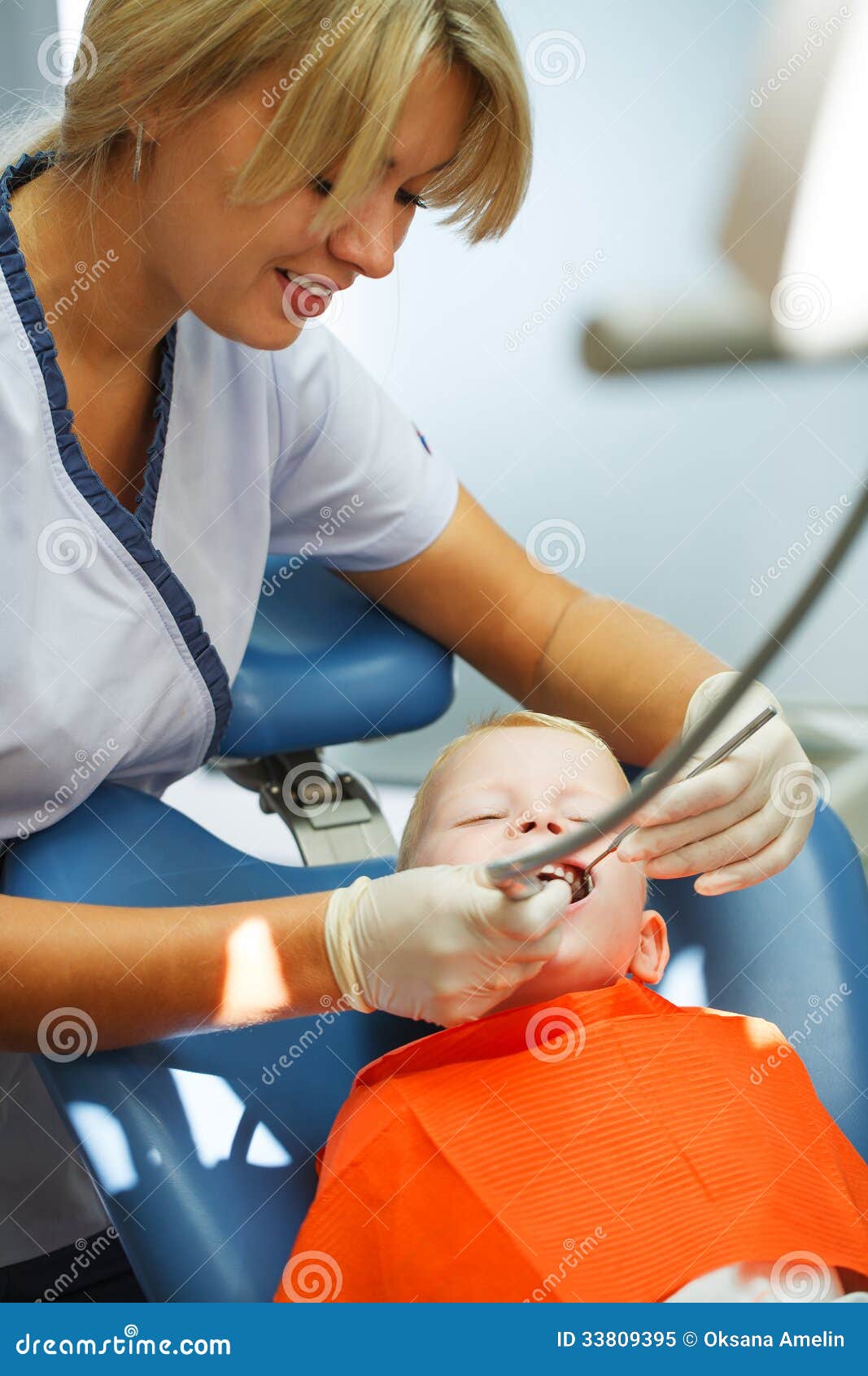 Dental Office Visit. Four year old boy visits the dentist at her office for a check up.