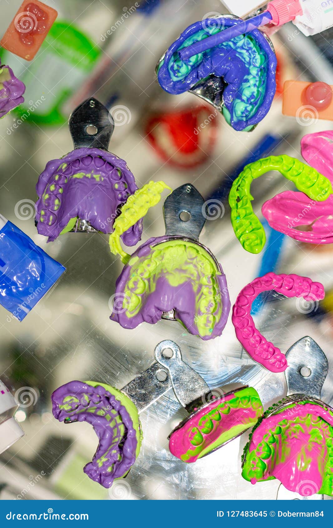 Dental Orthodontic Tools. Multicolored Device for Making a Molded