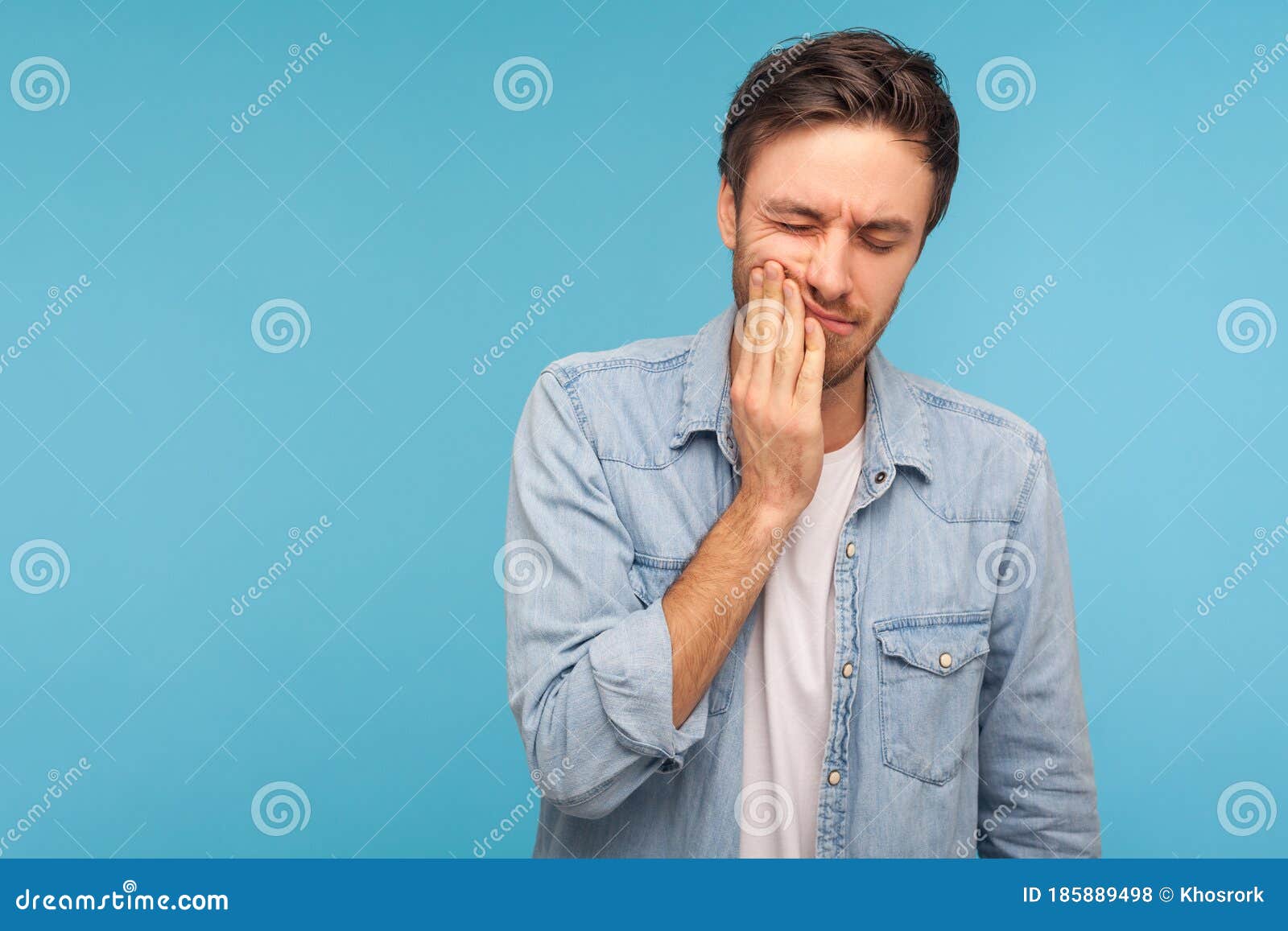 Dental Problems. Portrait of Unhealthy Man in Denim Shirt Pressing Sore ...