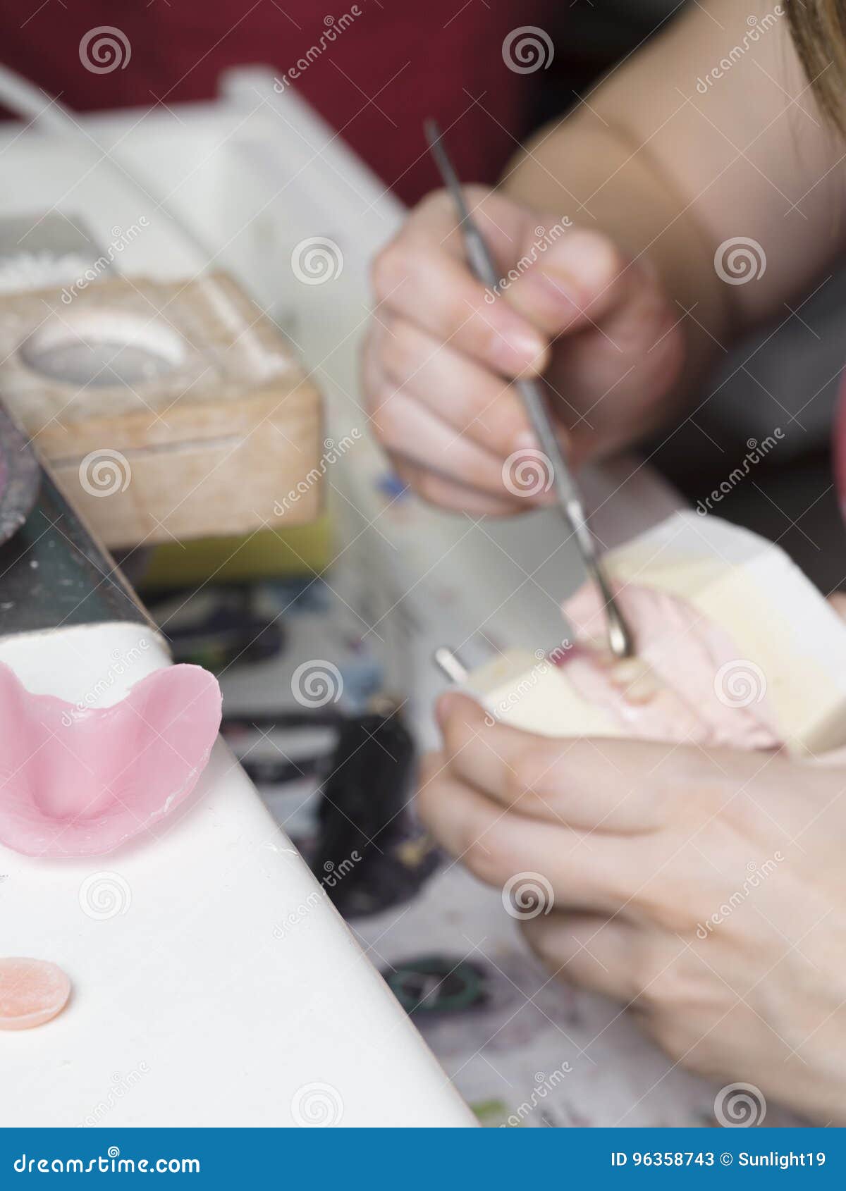 Dental Technician Doing Partial Dentures of Acrylic Resins Stock Image