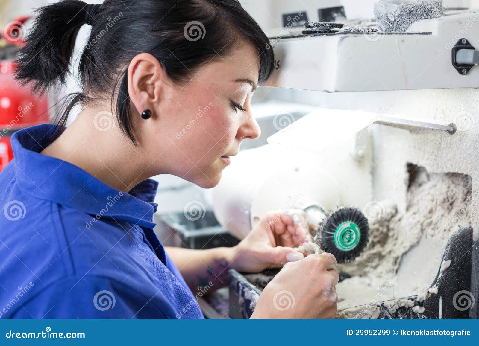 Dental Technician Polishing a Prosthesis Stock Image Image of female