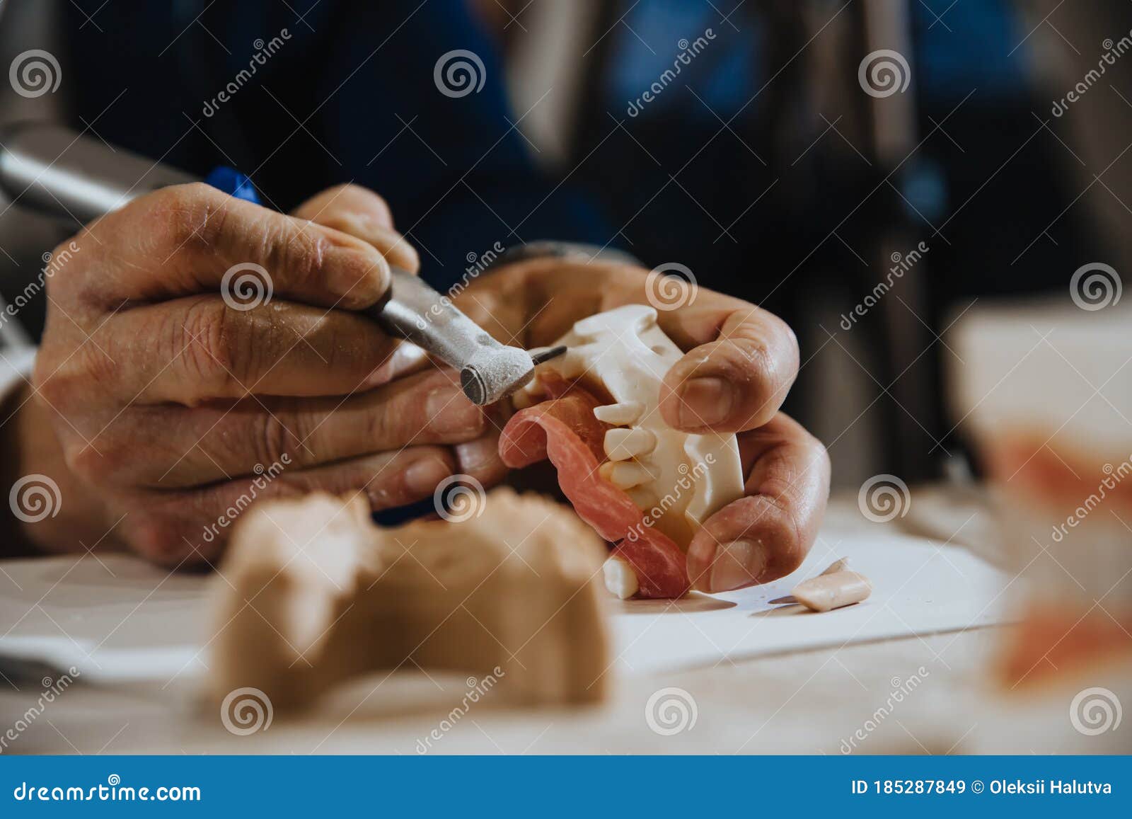 A Dental Technician Processes a Cast of the Jaw Stock Image Image of
