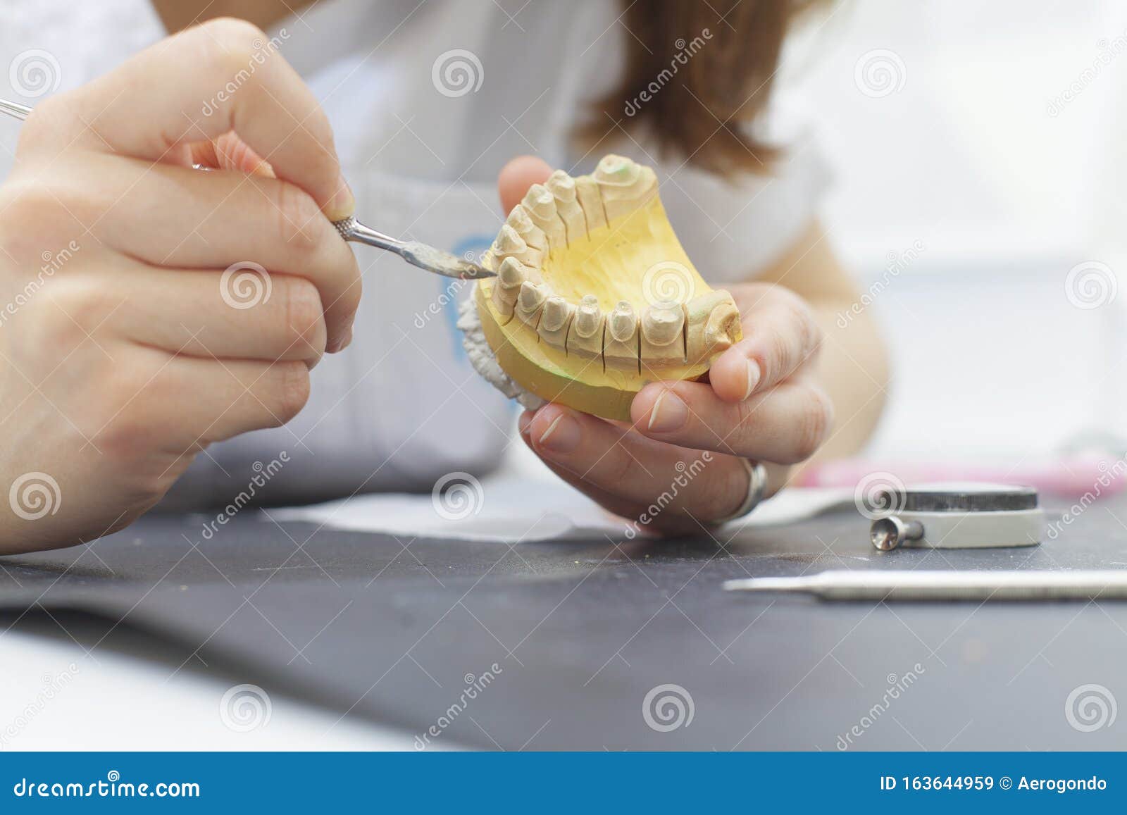 Dental Technician Shaping a Prosthesis Tooth Stock Image Image of
