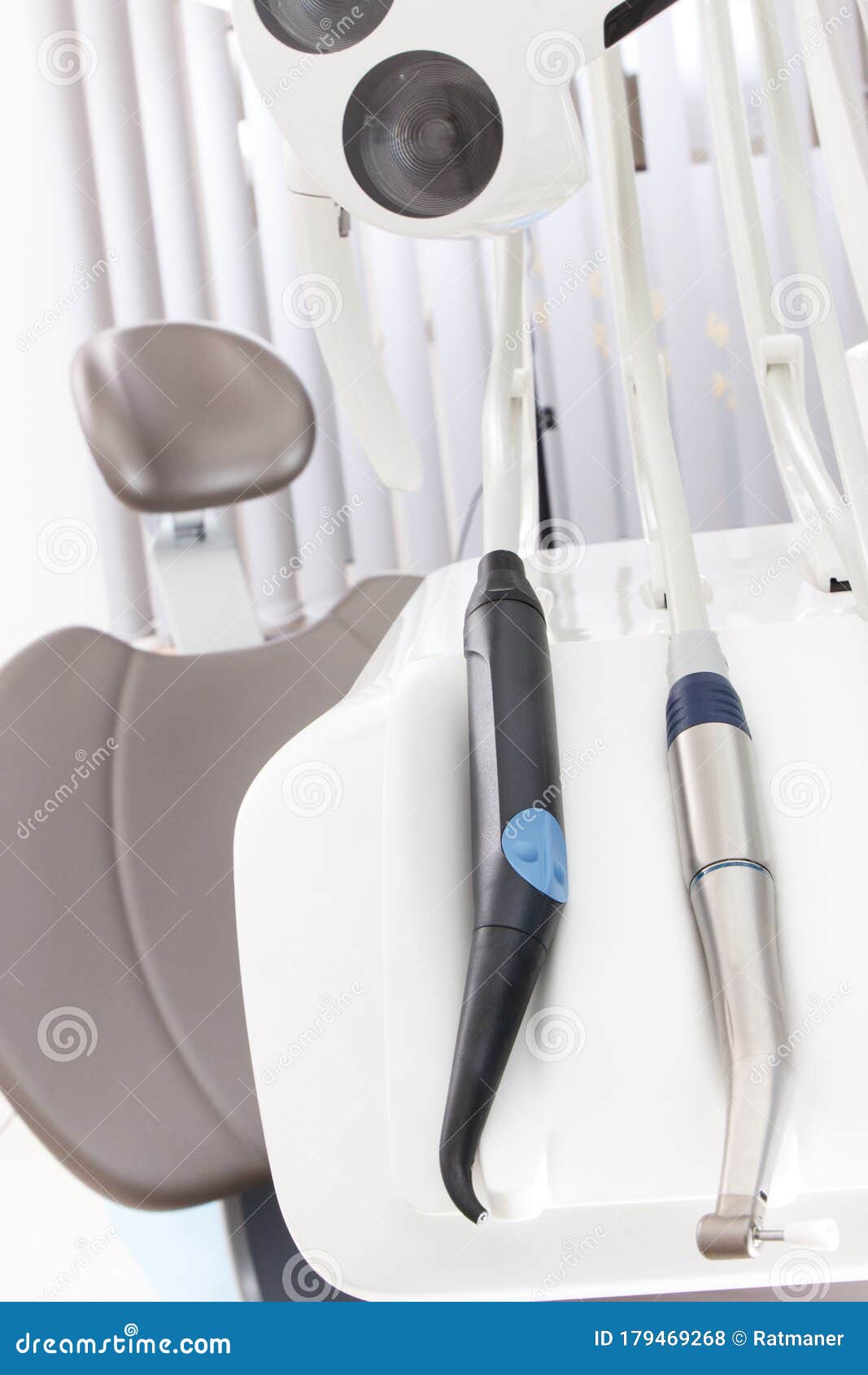Dental Tools and Accessories and Chair Used by Dentists Stock Photo