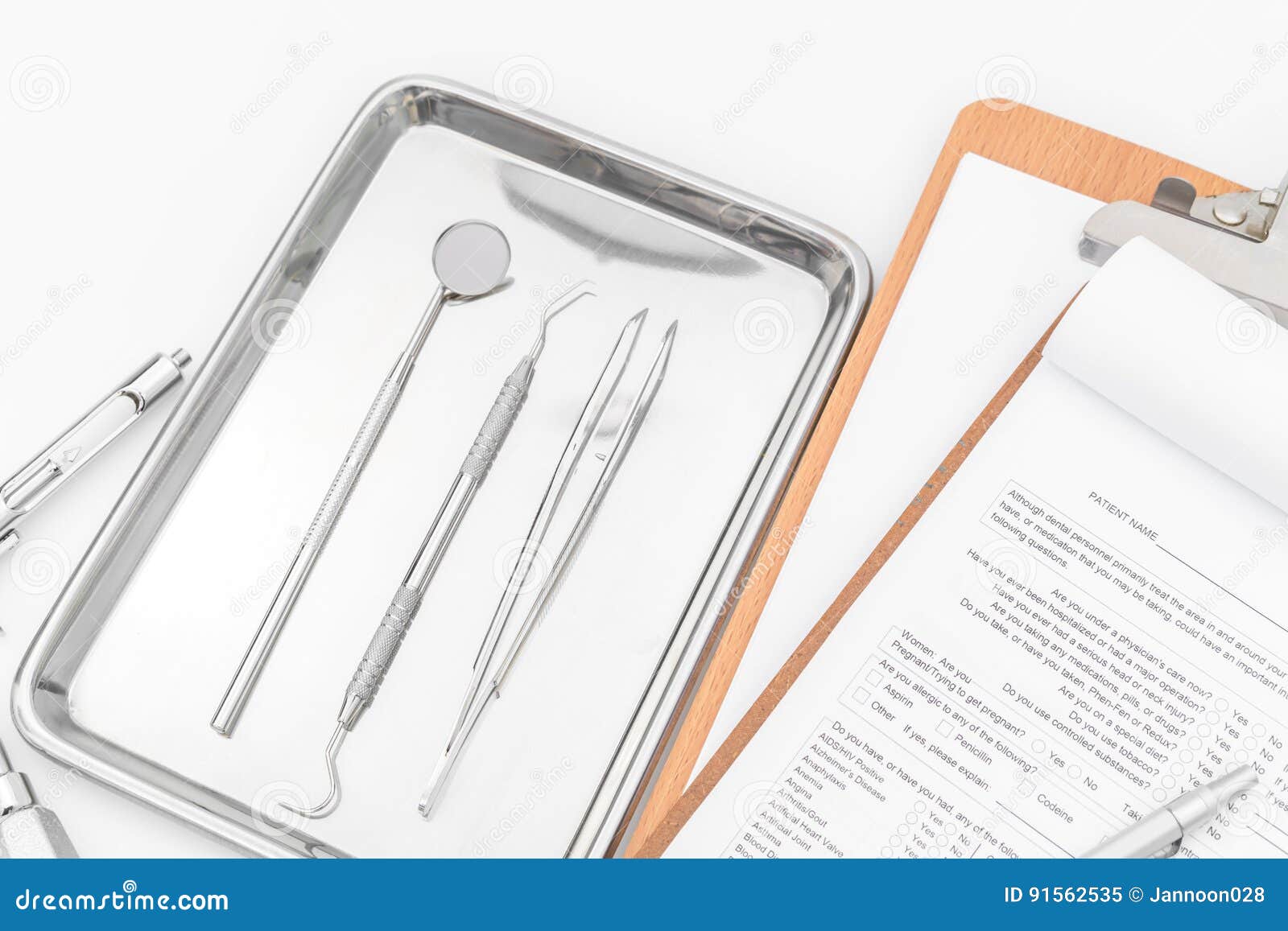 Dental Tools, Equipment and Dental Chart on White Background Stock