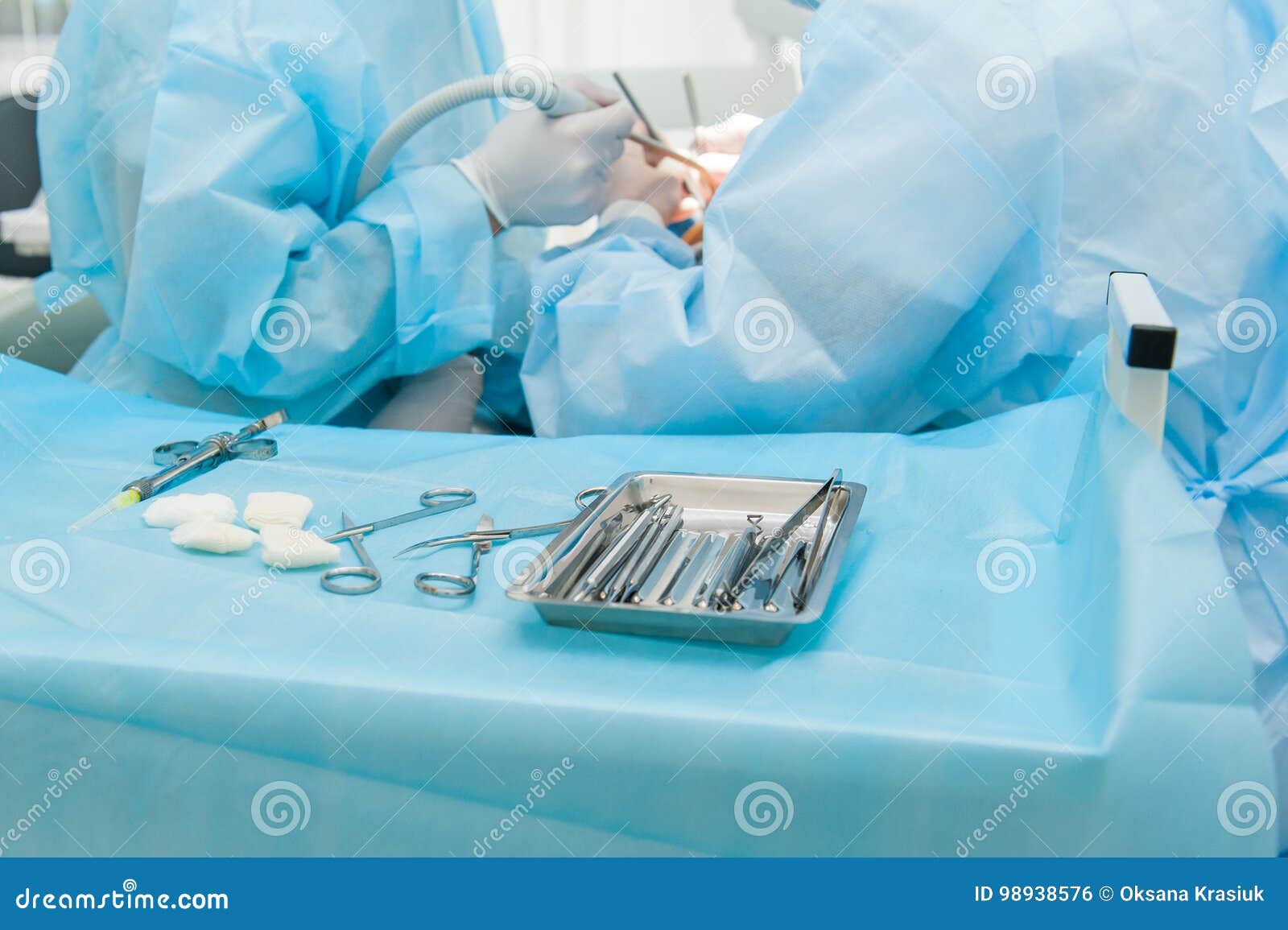 Dental Tools and Syringe at Dentist`s Surgery Table on the Background