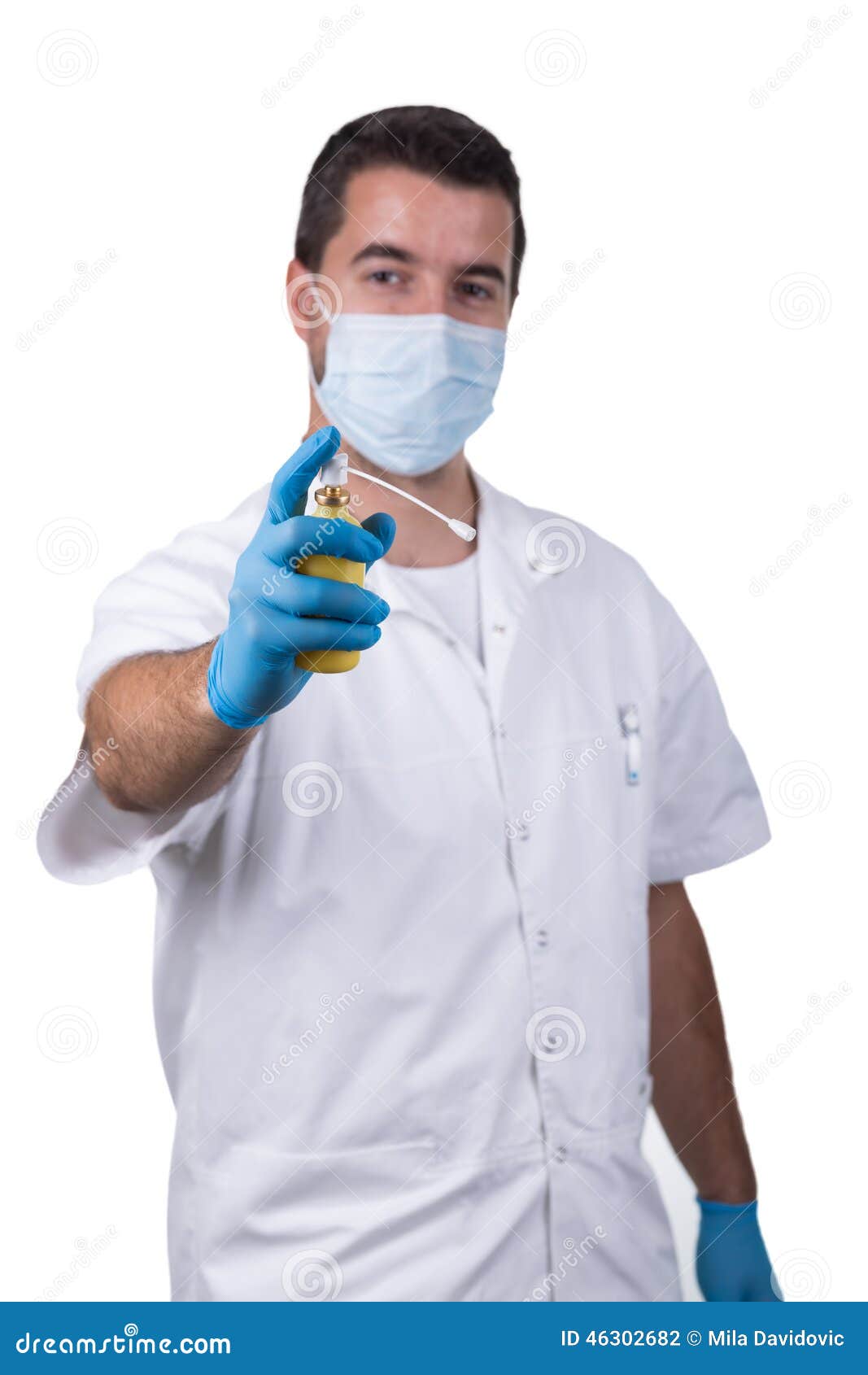 dentist with anesthetic spray
