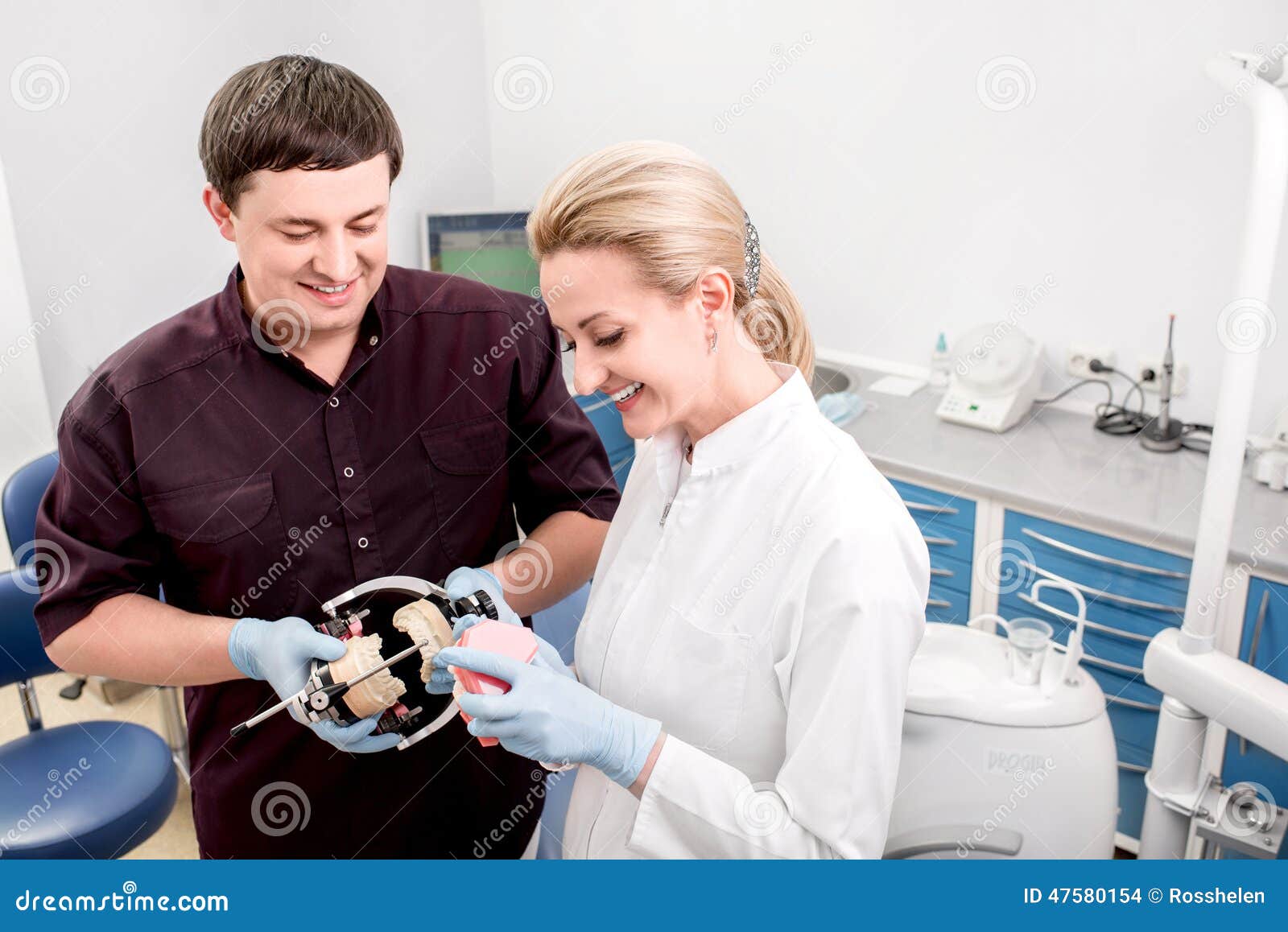 Dentist with Assistant in the Dental Office Stock Photo Image of