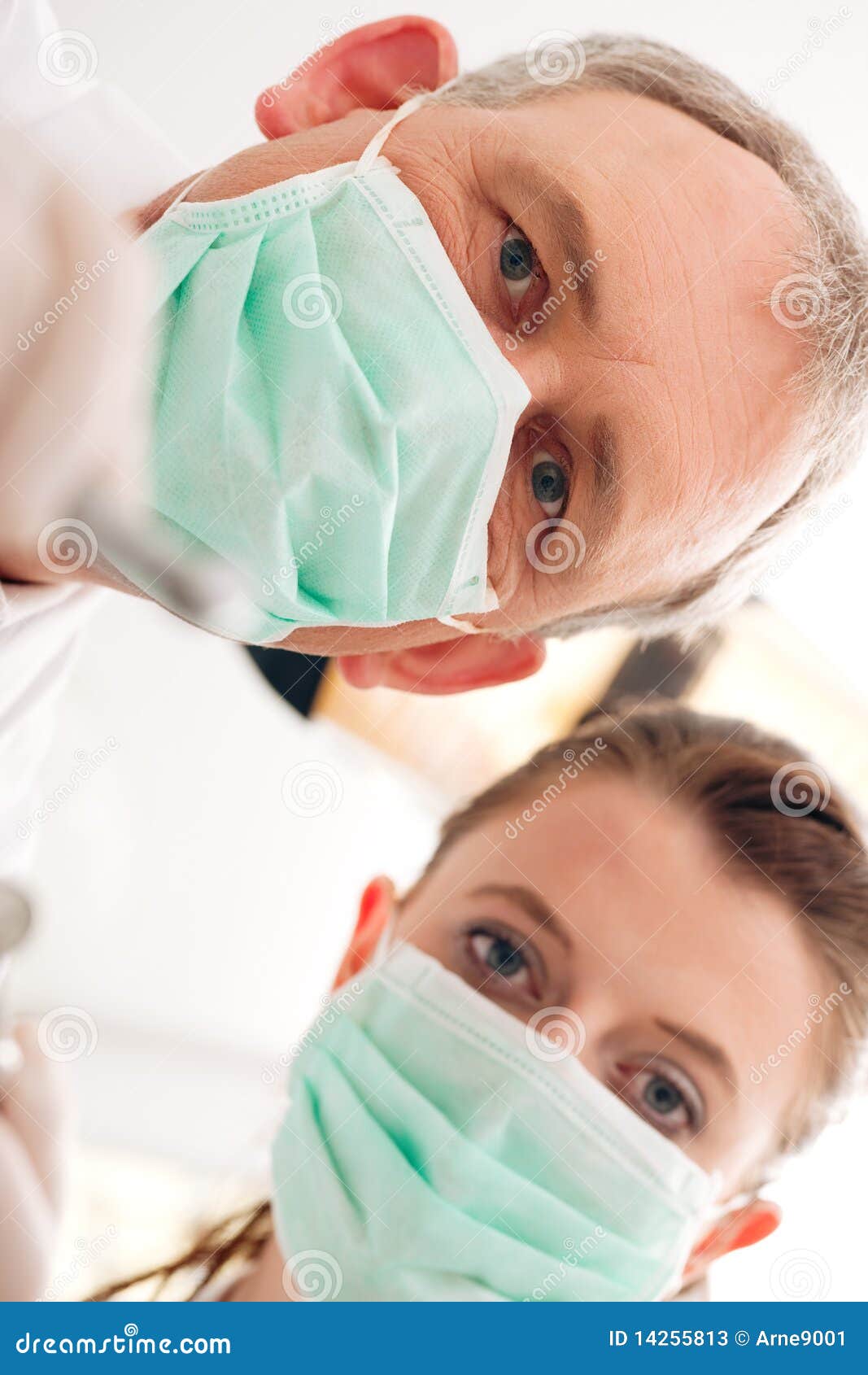 Dentist, Assistant and Drill in a Treatment Stock Image Image of