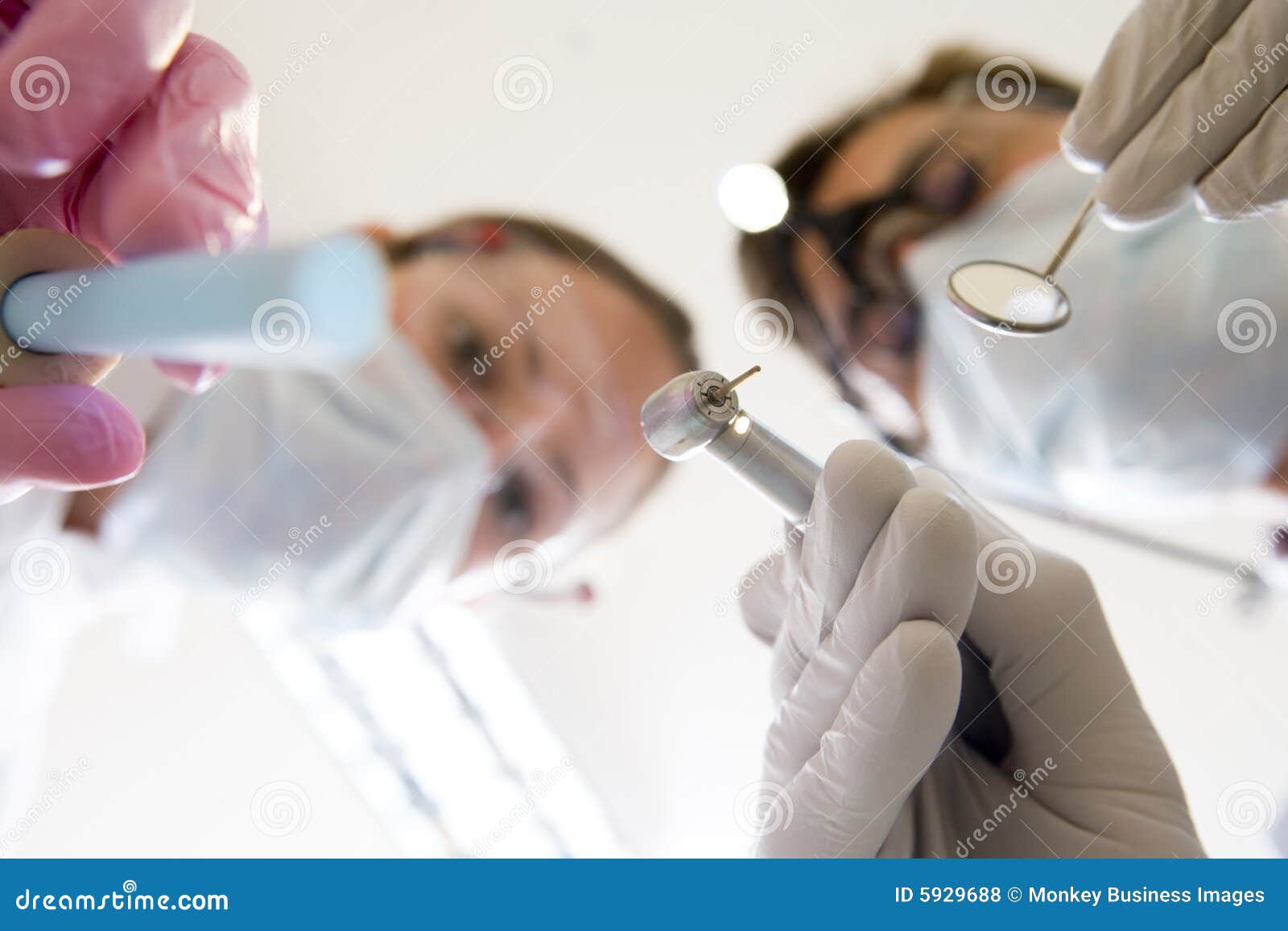 Dentist and Assistant Holding Pick and Mirror Stock Photo Image of
