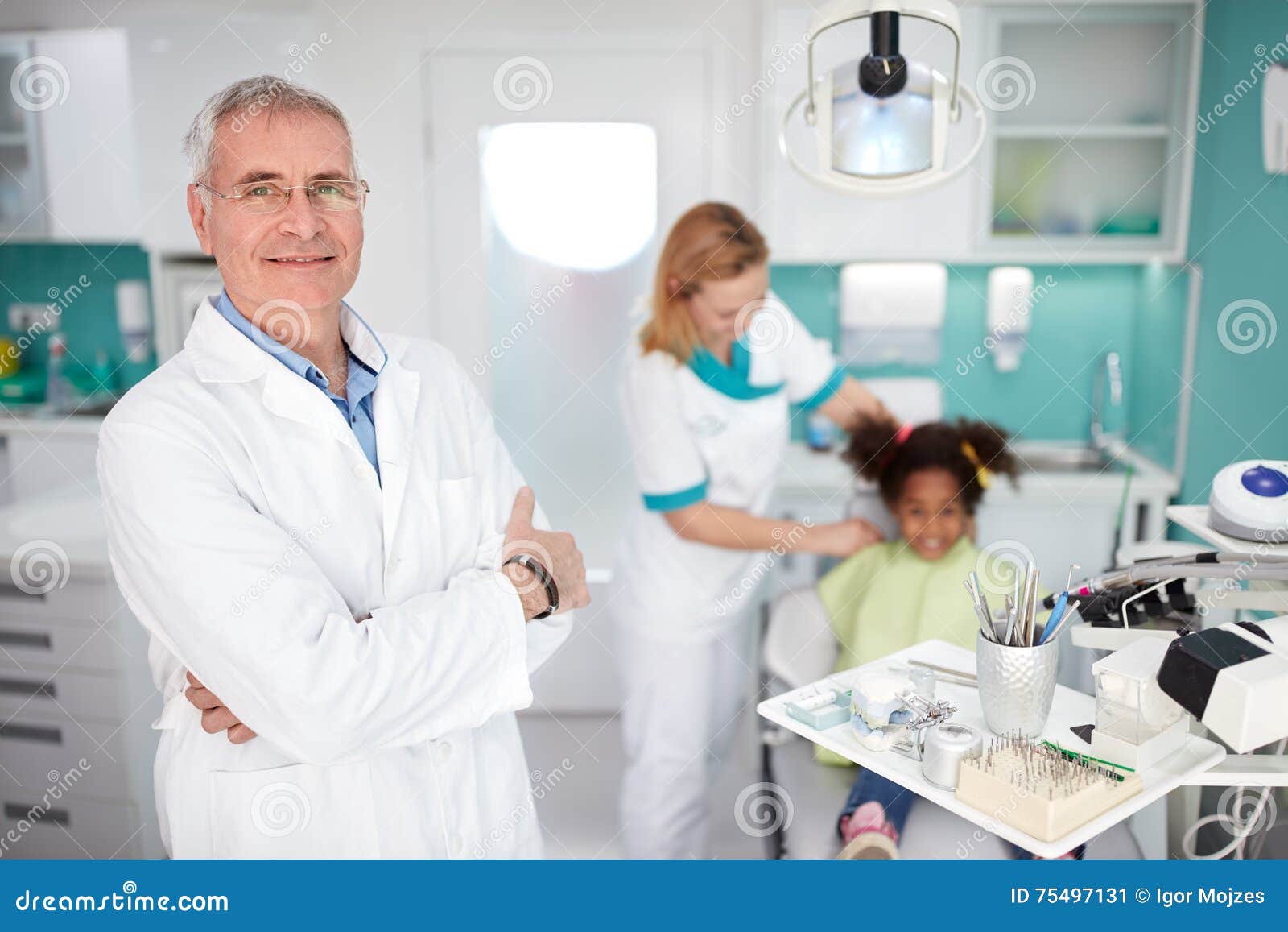 Dentist with Assistant before Starting Work Stock Image Image of