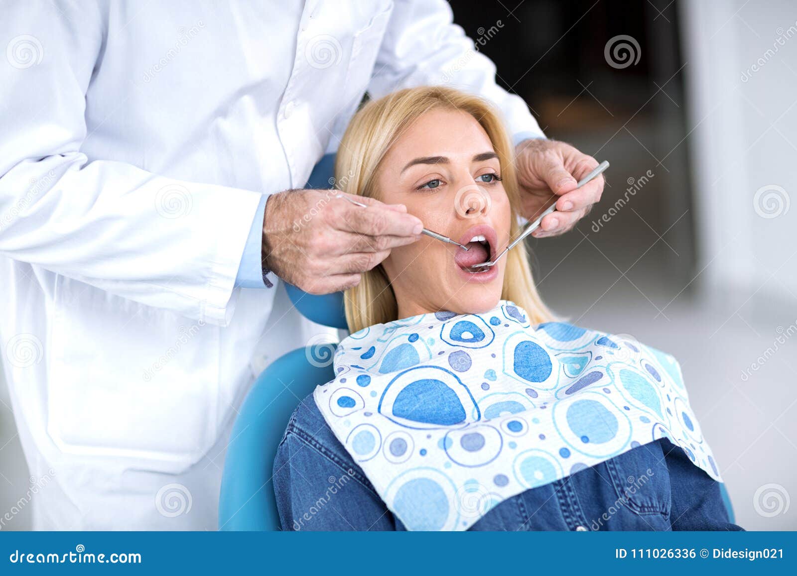 The Dentist Examines Patient and Seeks Broken Teeth Stock Photo Image of health, girl 111026336