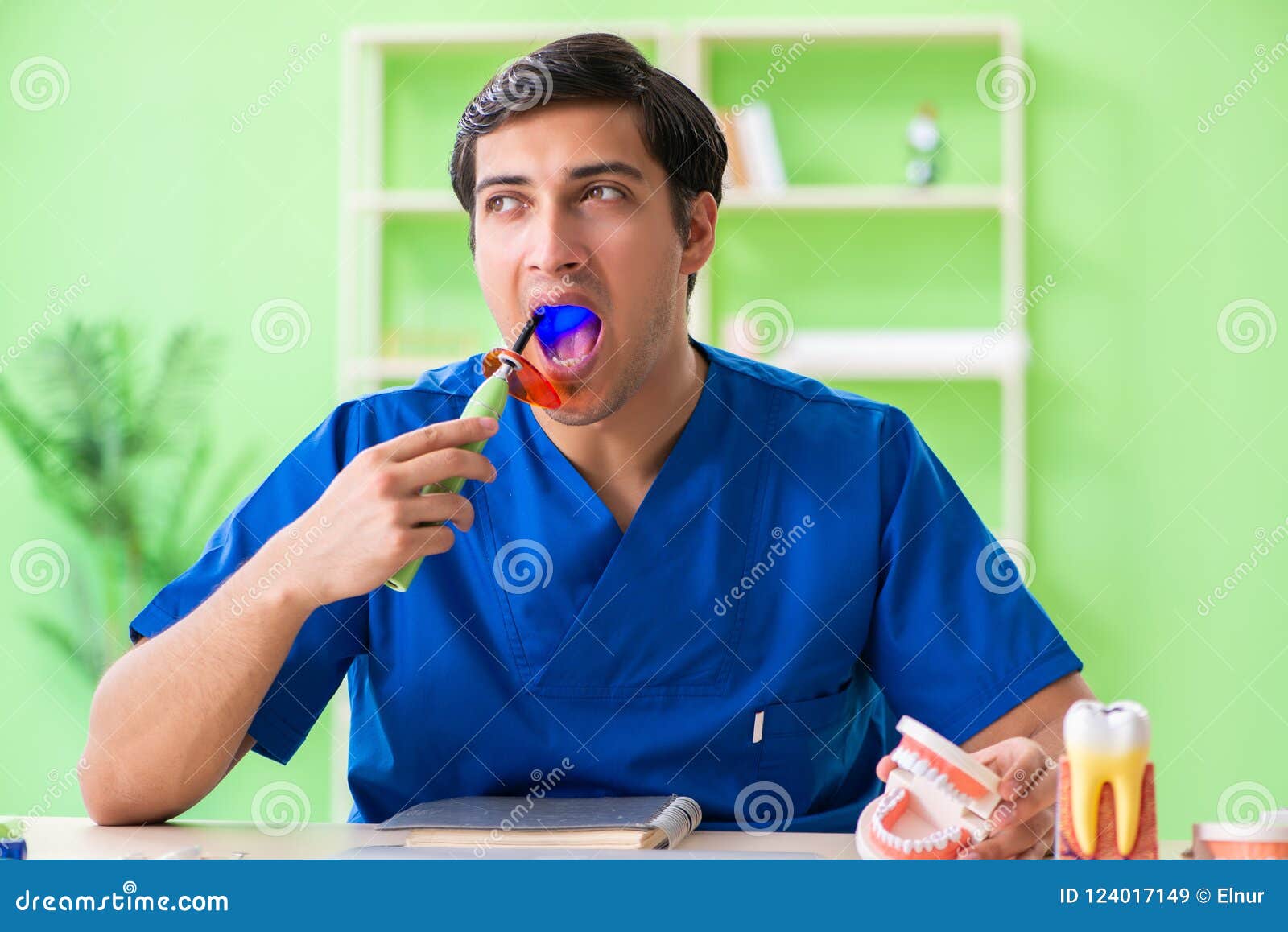 The Dentist Doctor Working in the Clinic Stock Image Image of implant, curing 124017149