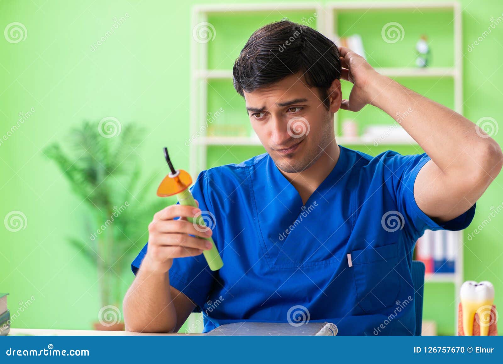 The Dentist Doctor Working in the Clinic Stock Photo Image of