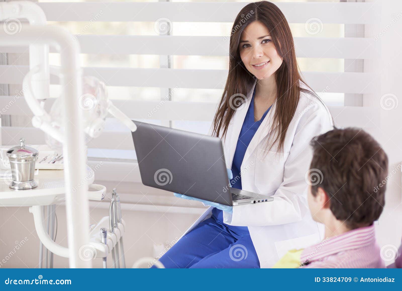 Dentist Doing Some Work in a Laptop Stock Image Image of patient